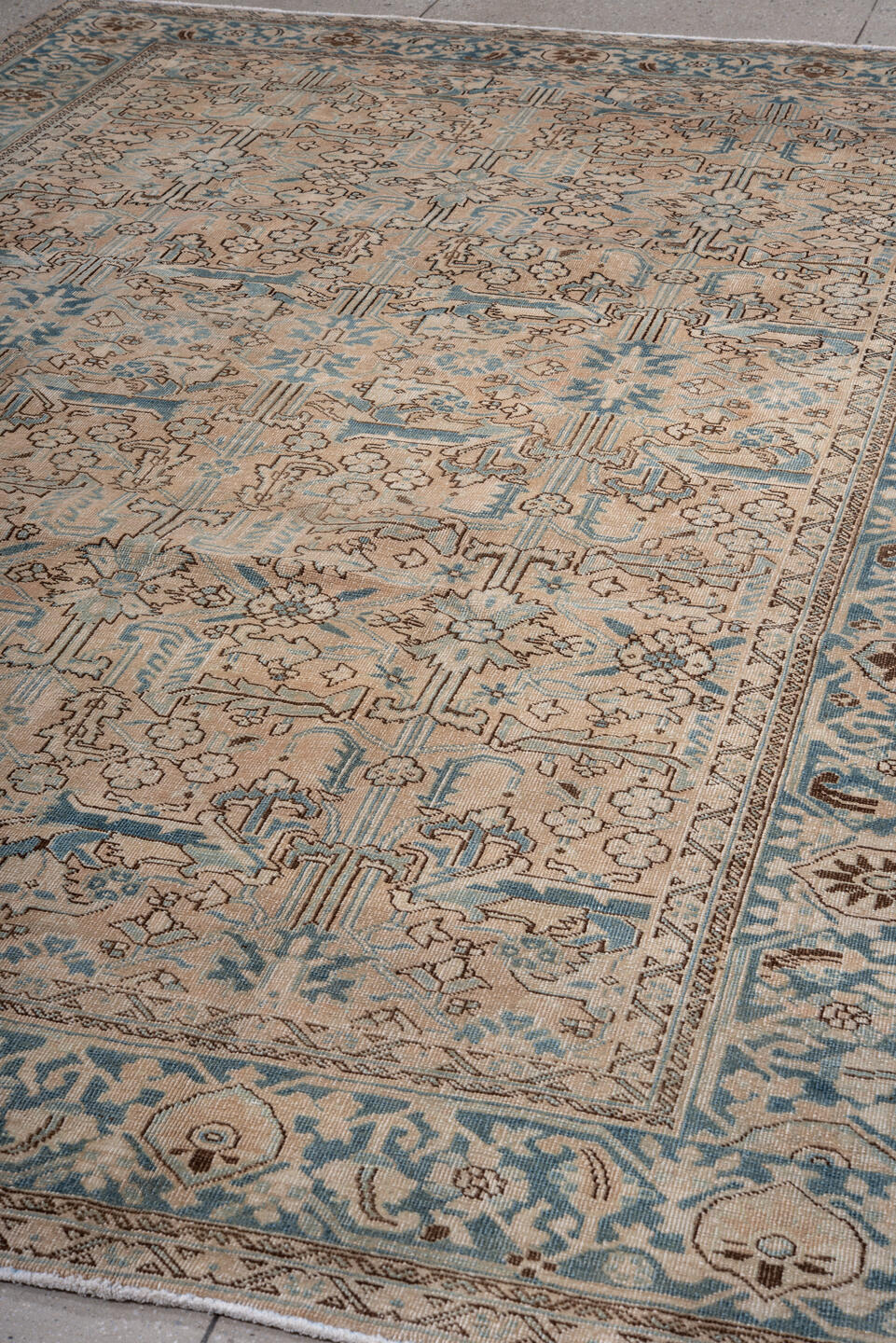 7' x 11' one-of-a-kind handmade antique Heriz large size rug. Color palette: ivory, sky blue, taupe, camel, brown