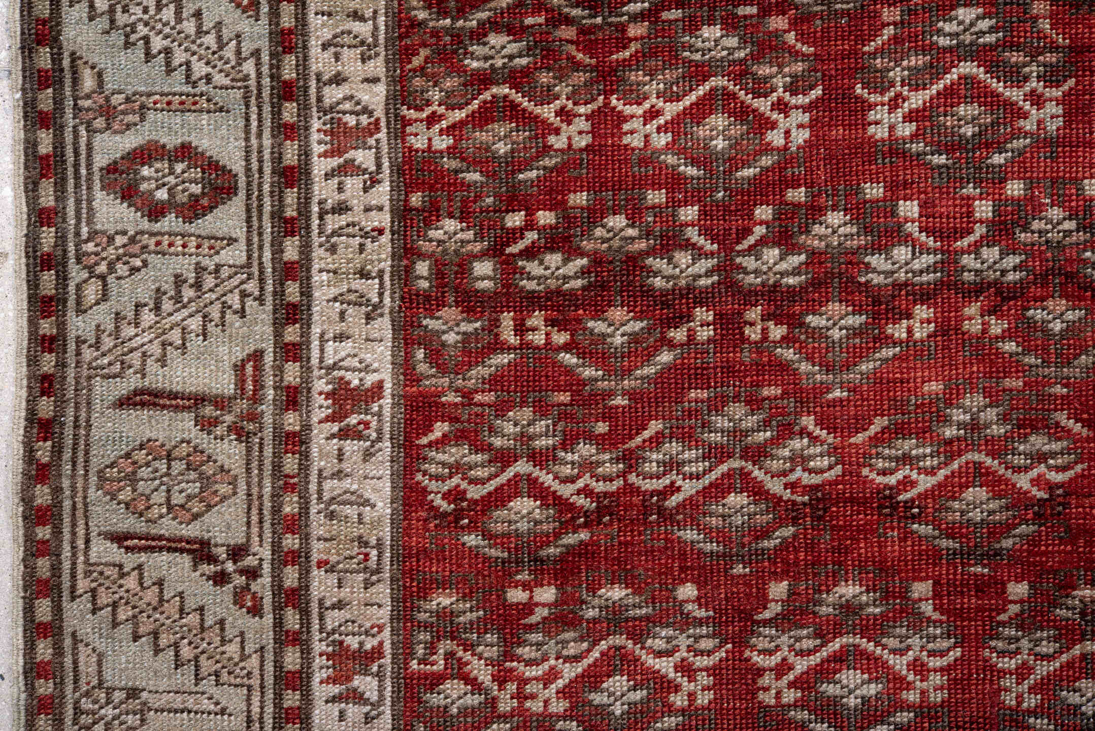 2' x 14' one-of-a-kind handmade vintage Caucasian runner rug. Color palette: brown, gray, light gray, off-white, pink, red