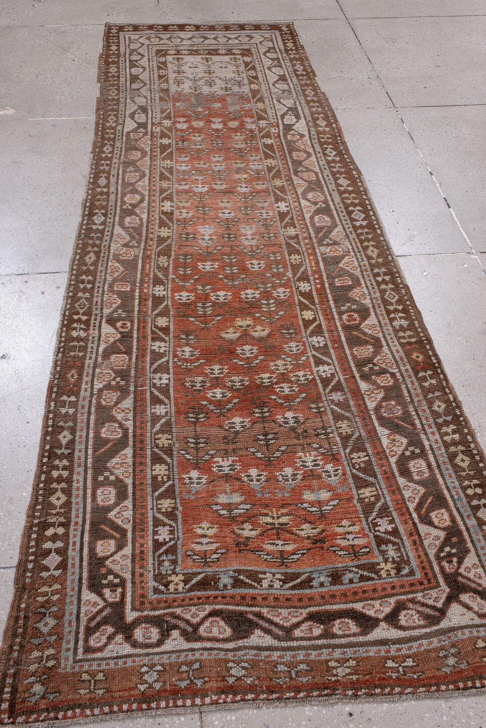 3' x 10' one-of-a-kind handmade antique NW Persian runner rug. Color palette: rust, brown, ivory, terra cotta, taupe