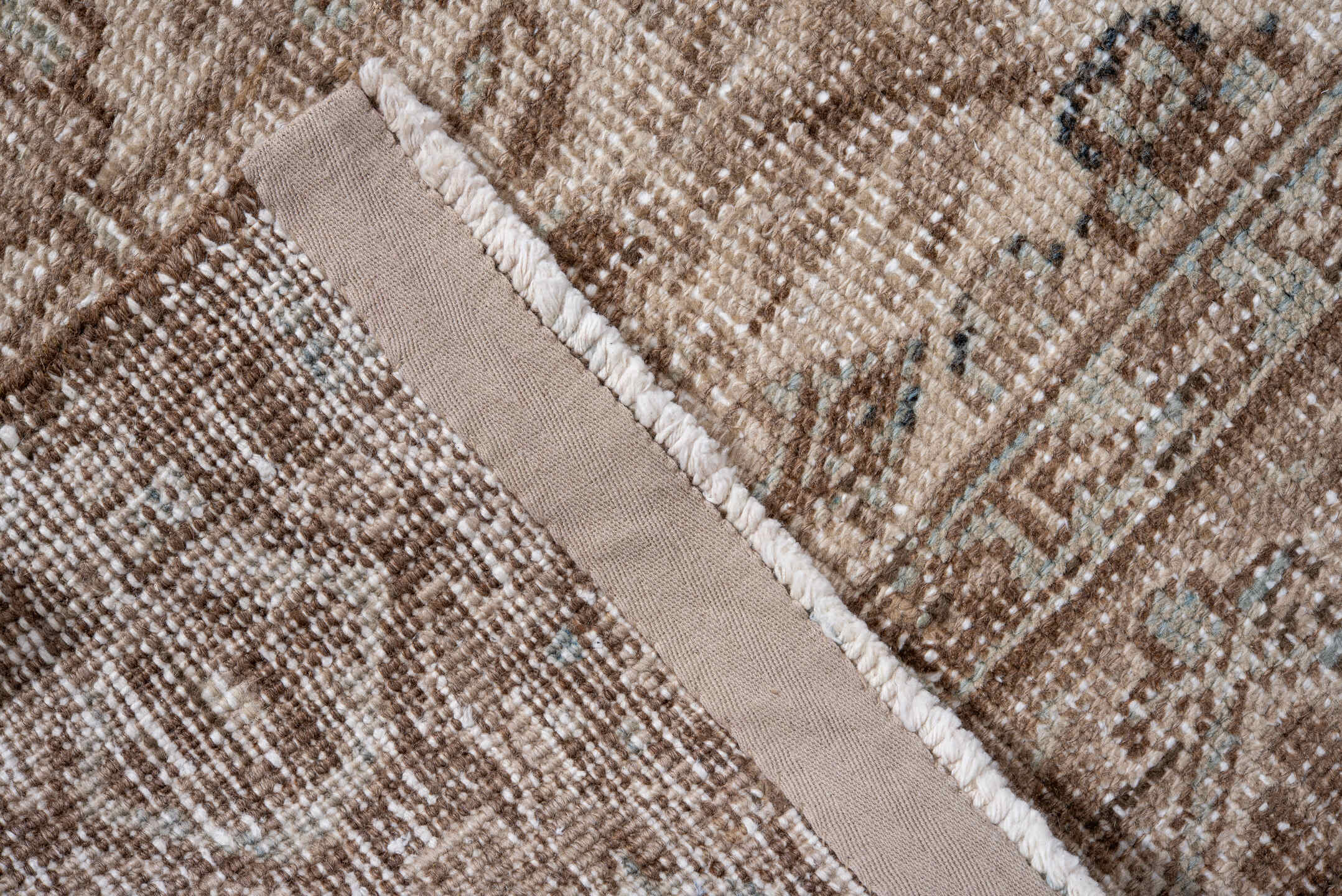 7' x 9' one-of-a-kind handmade antique Heriz rug. Color palette: taupe, brown, ivory, pale blue, beige, gray, light blue