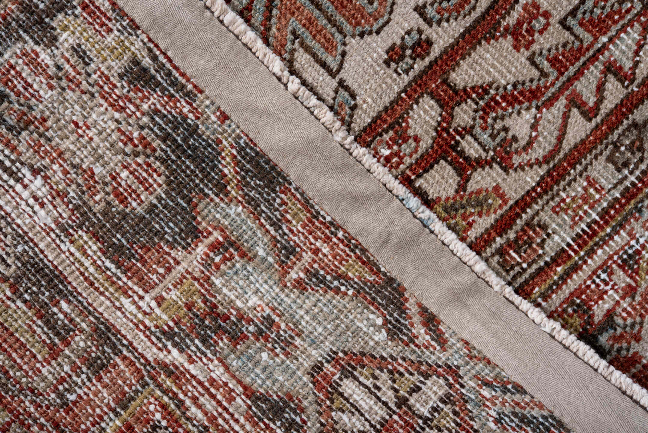 6' x 8' one-of-a-kind handmade antique Heriz rug. Color palette: ivory, rust, brick, sky blue, olive, taupe, brown, charcoal