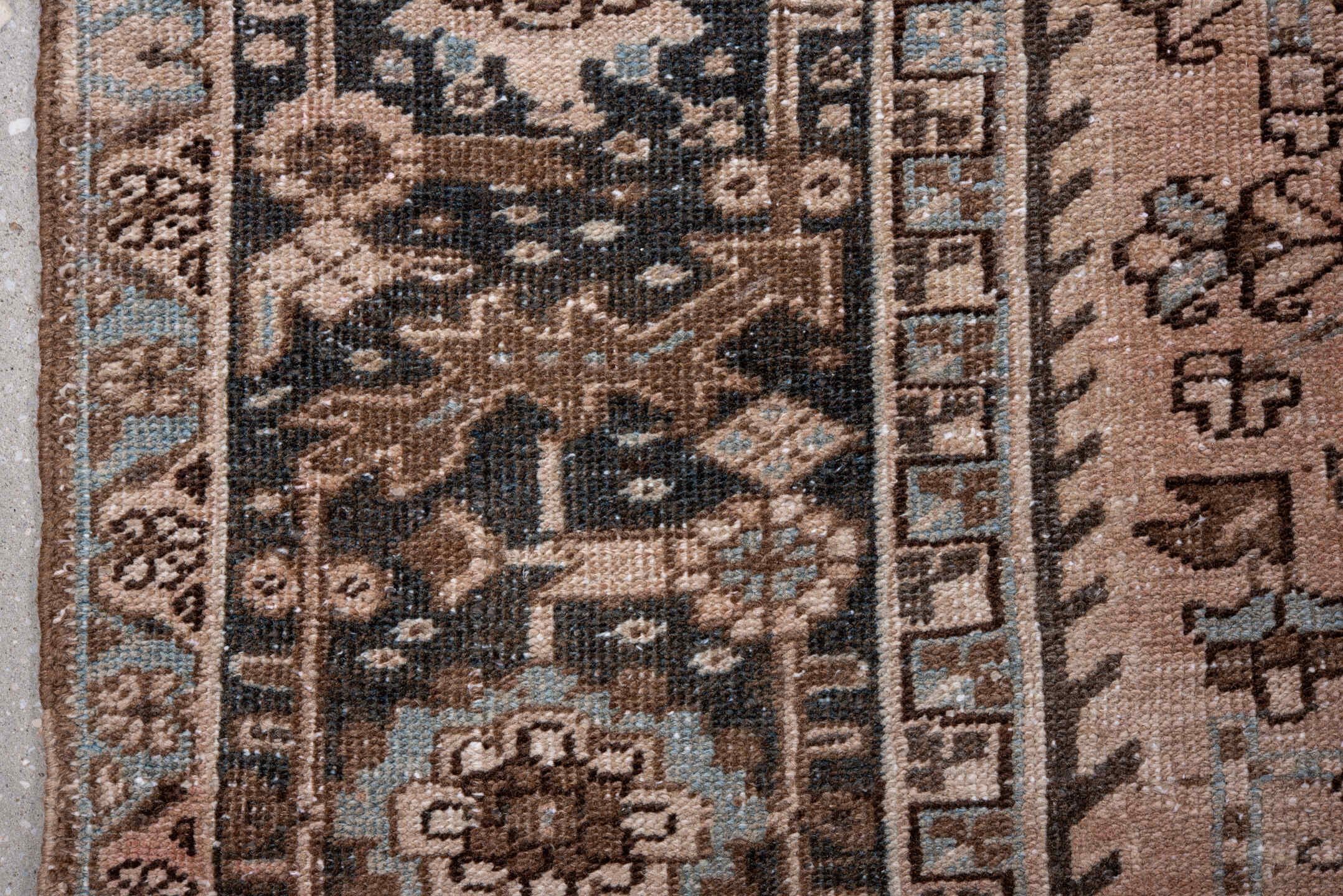 9' x 12' one-of-a-kind handmade antique Heriz large size rug. Color palette: ivory, camel, charcoal, taupe, pale blue, brown