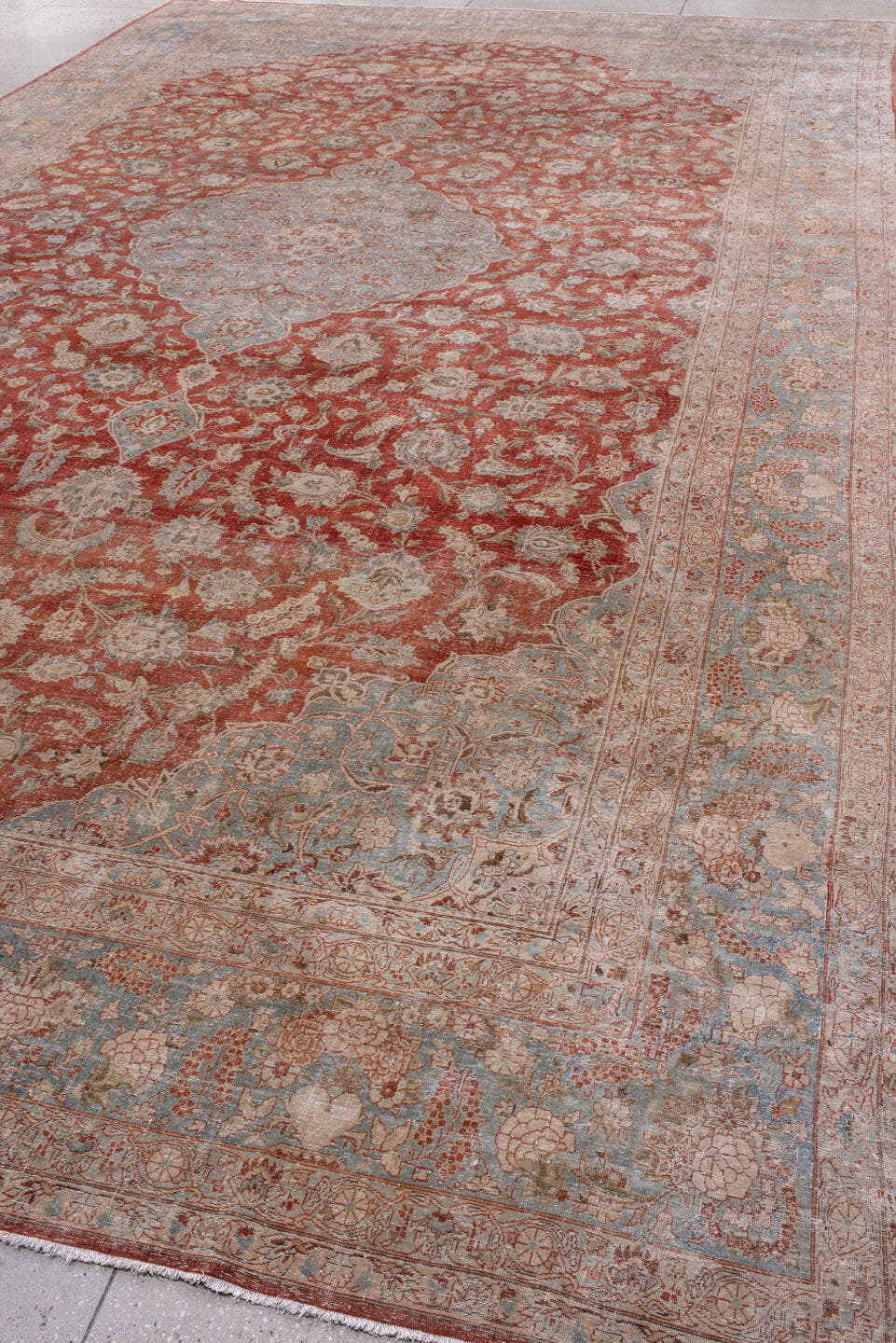 10' x 17' one-of-a-kind handmade antique Kashan rug. Color palette: rust, light blue, ivory, terra cotta, beige, taupe