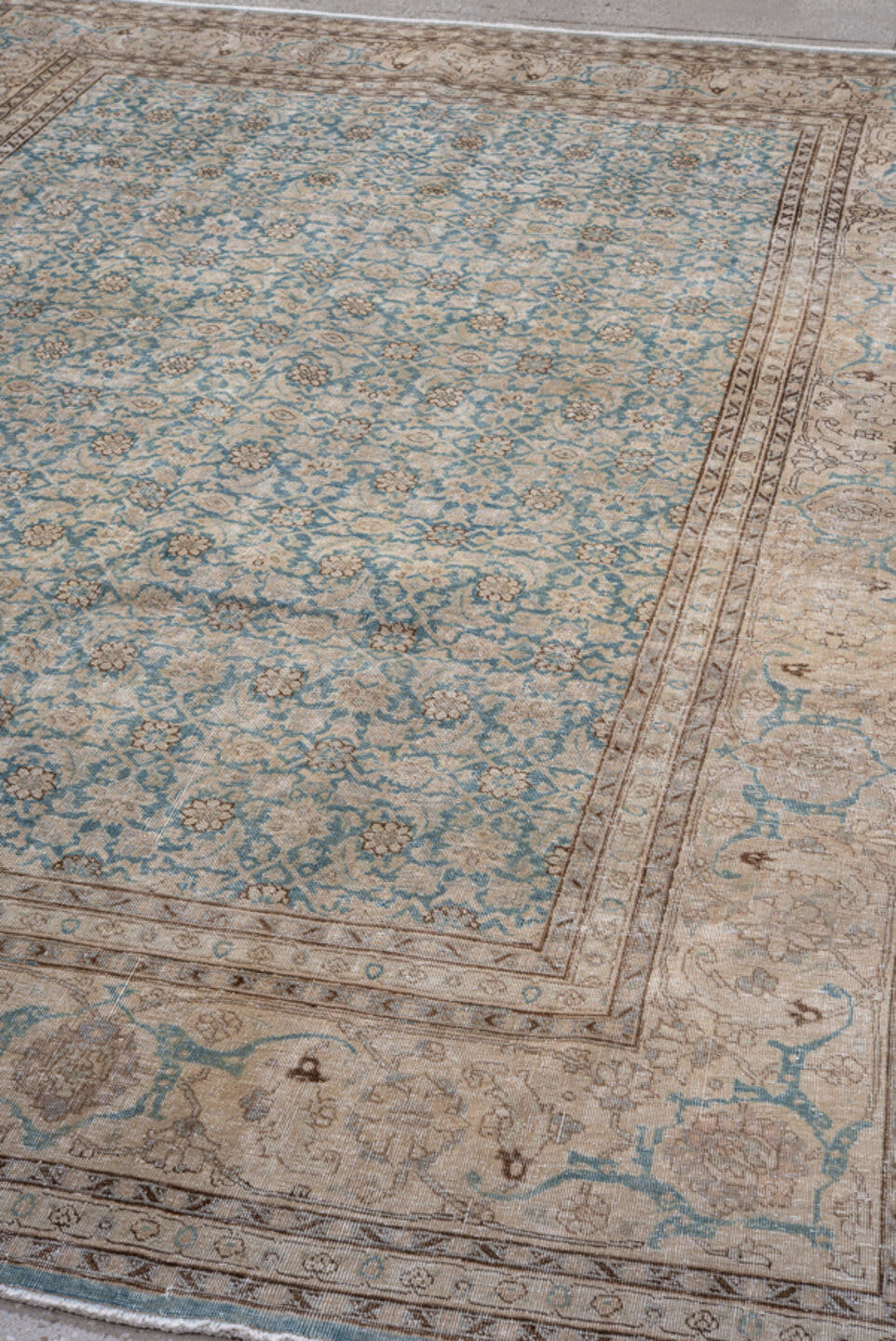 6' x 9' one-of-a-kind handmade antique Tabriz medium size rug. Color palette: ivory, pale blue, taupe, beige, slate, camel
