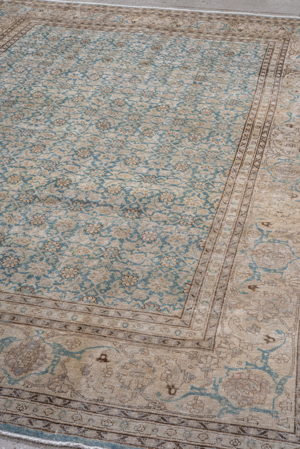 6' x 9' one-of-a-kind handmade antique Tabriz medium size rug. Color palette: ivory, pale blue, taupe, beige, slate, camel