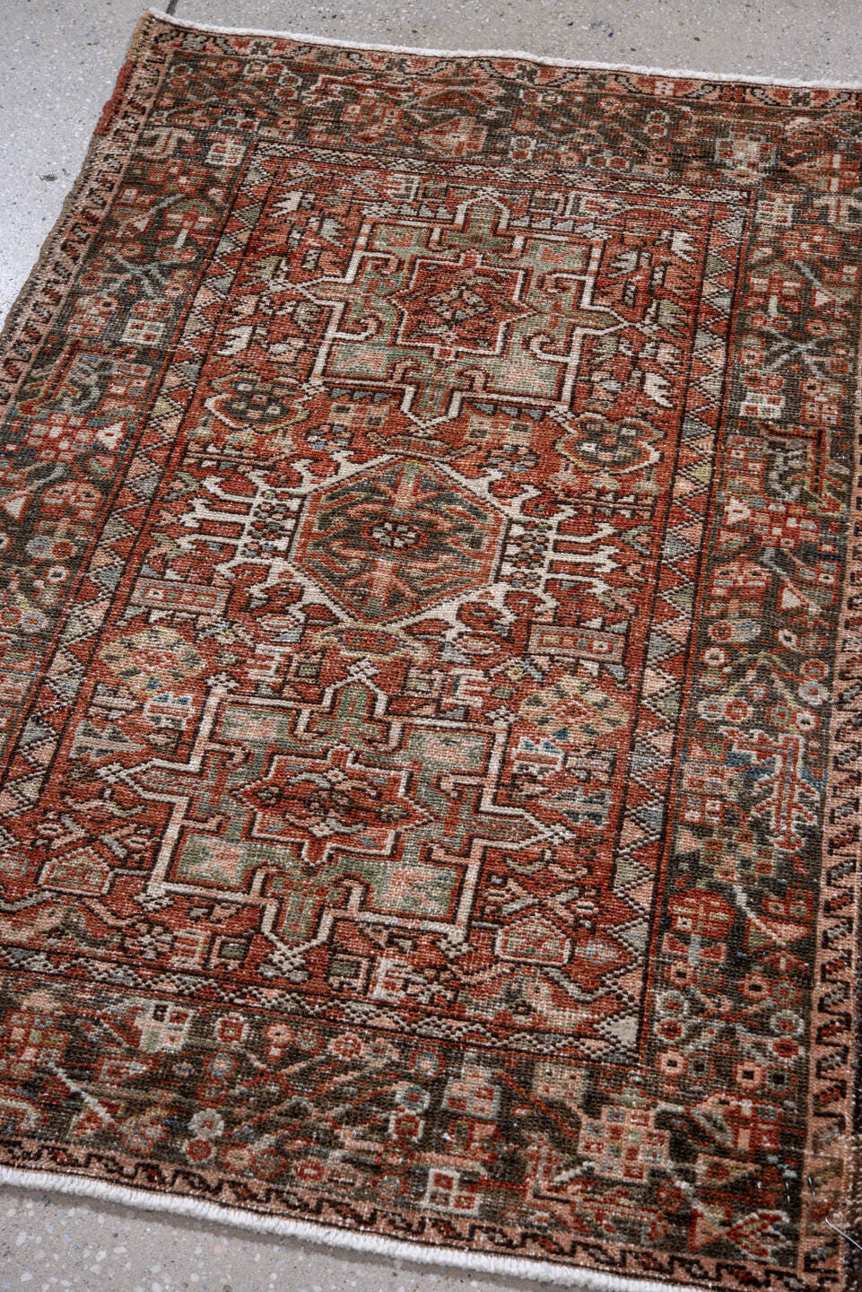 2' x 3' one-of-a-kind handmade antique Karaje small size rug. Color palette: rust, charcoal, ivory, sage, terra cotta, taupe
