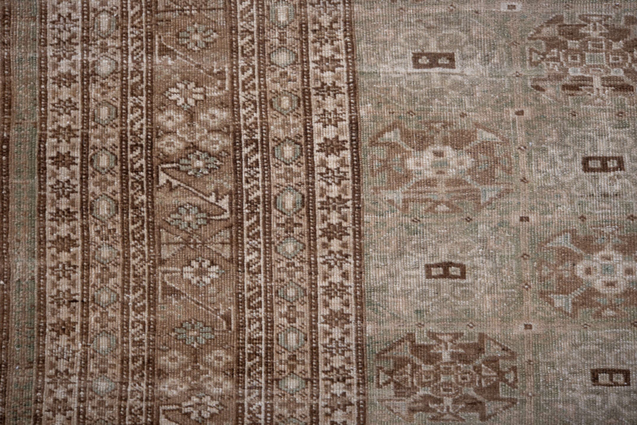5' x 8' one-of-a-kind handmade antique Ardebil medium size rug. Color palette: taupe, brown, ivory, camel, beige, gray