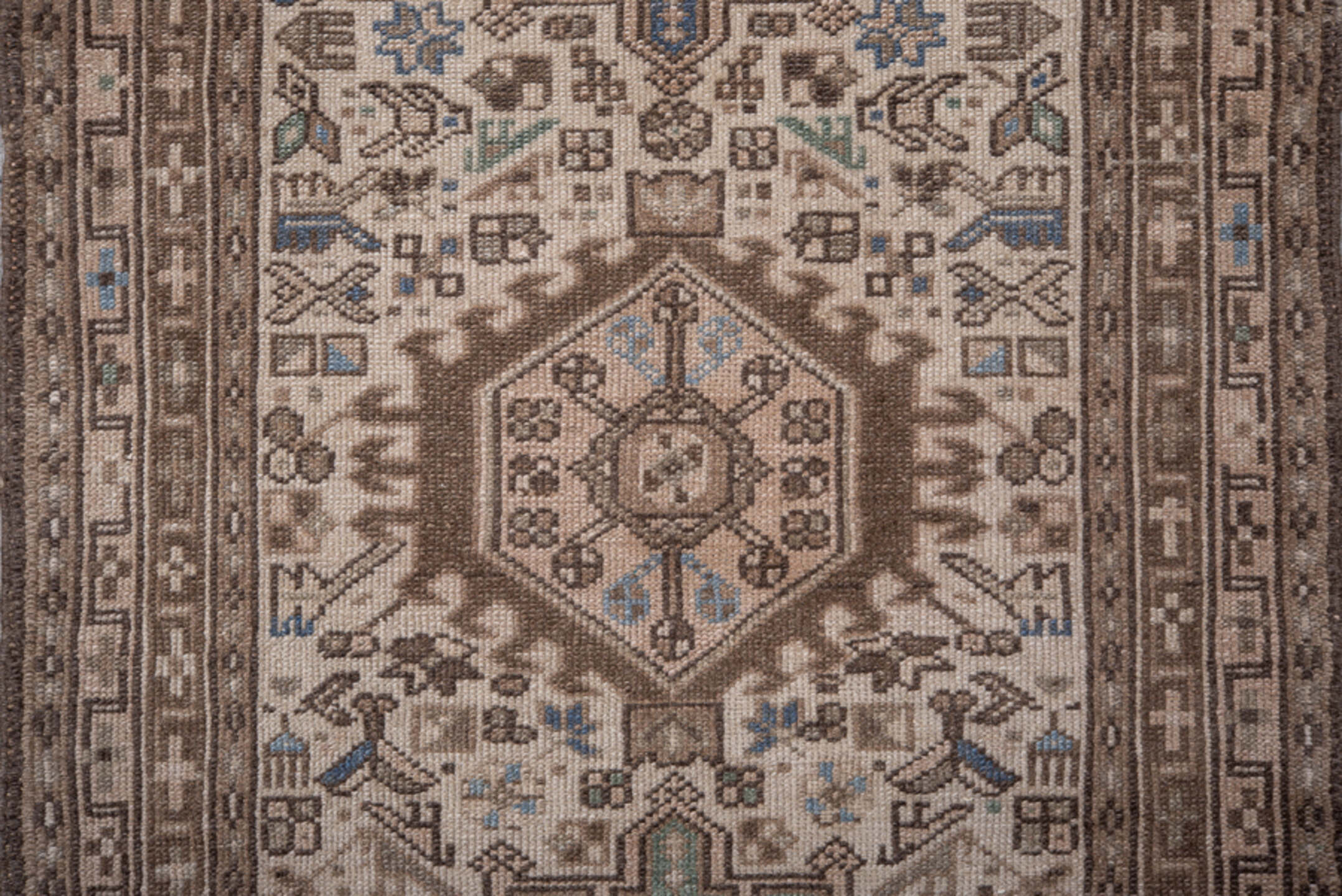 2' x 9' one-of-a-kind handmade antique Karaje runner rug. Color palette: ivory, brown, taupe, slate blue, sage, charcoal