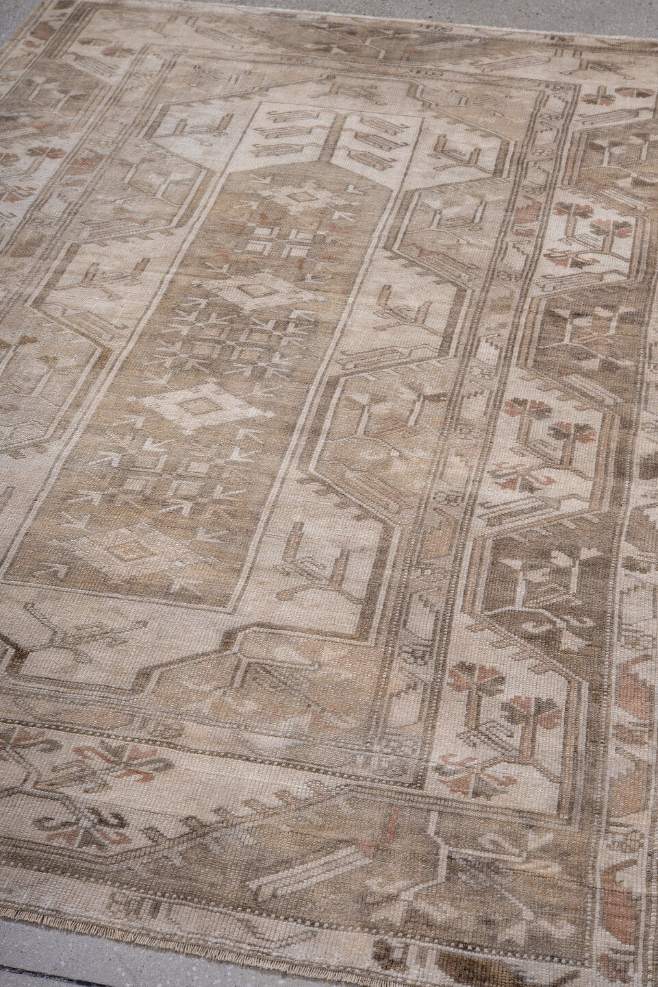 4' x 7' one-of-a-kind handmade antique Oushak rug. Color palette: ivory, taupe, beige, camel, brown, rose, sage, gray, pink