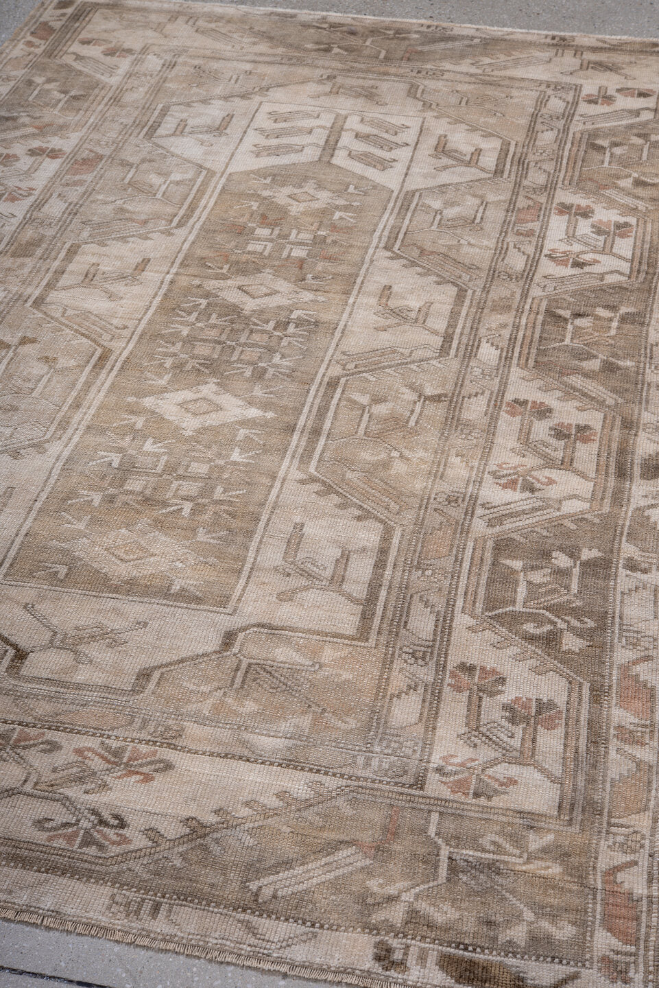 4' x 7' one-of-a-kind handmade antique Oushak rug. Color palette: ivory, taupe, beige, camel, brown, rose, sage, gray, pink