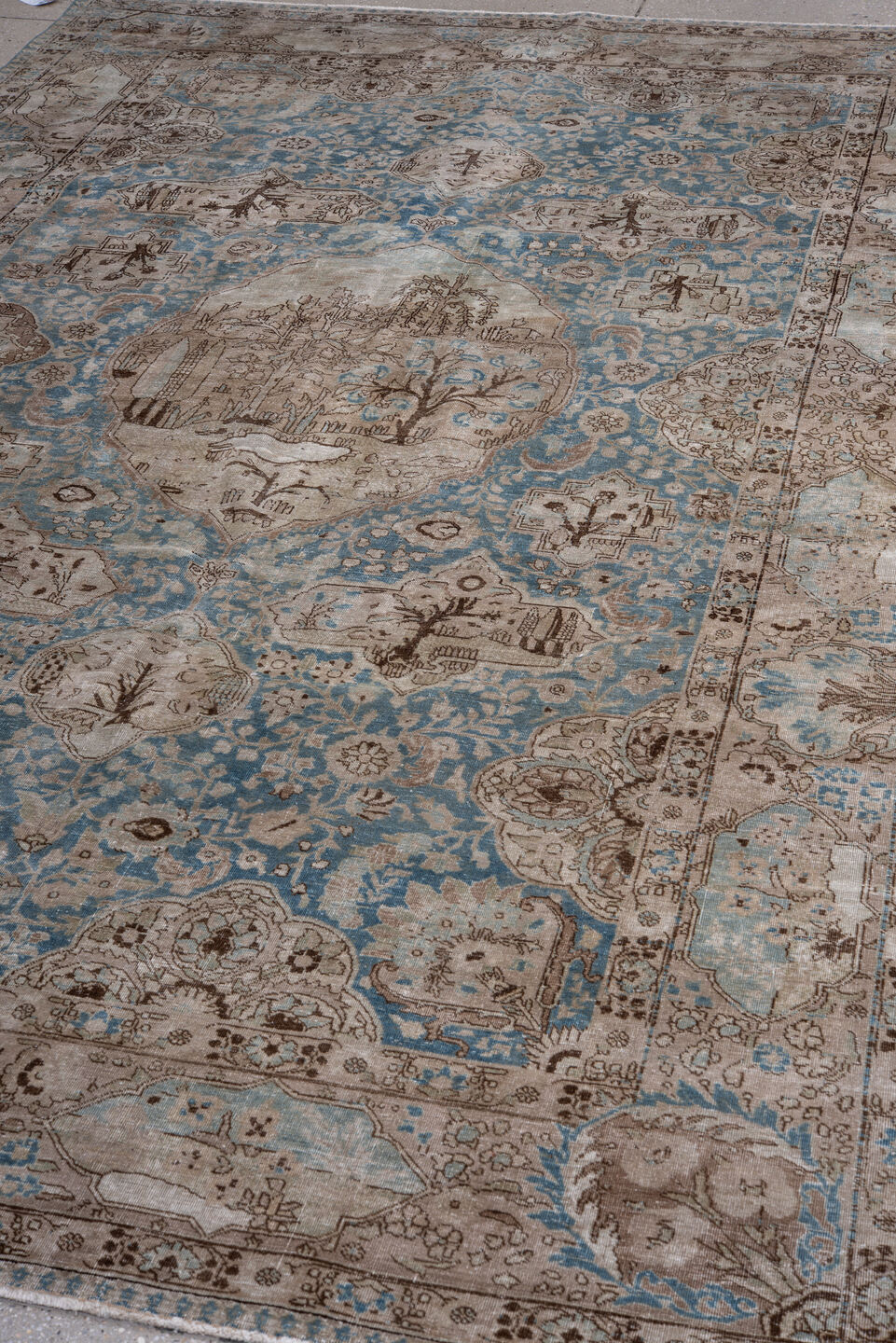 6' x 9' one-of-a-kind handmade antique Tabriz medium size rug. Color palette: sky blue, ivory, taupe, brown, beige