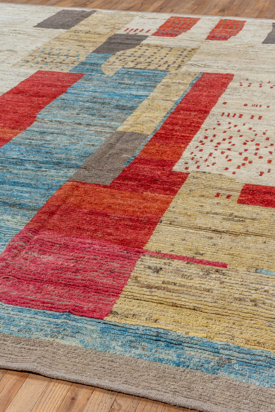 9' x 12' one-of-a-kind handmade vintage Tulu large size rug. Color palette: ivory, sky blue, crimson, gold, charcoal, rose