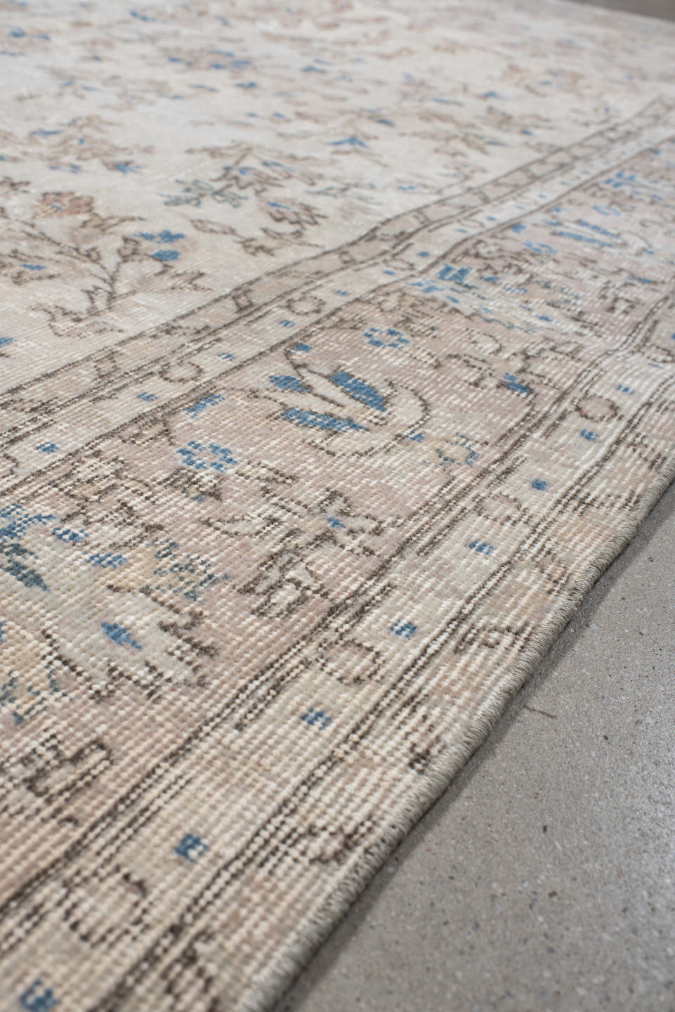6' x 9' one-of-a-kind handmade antique Sparta medium size rug. Color palette: ivory, beige, sky blue, taupe, cream