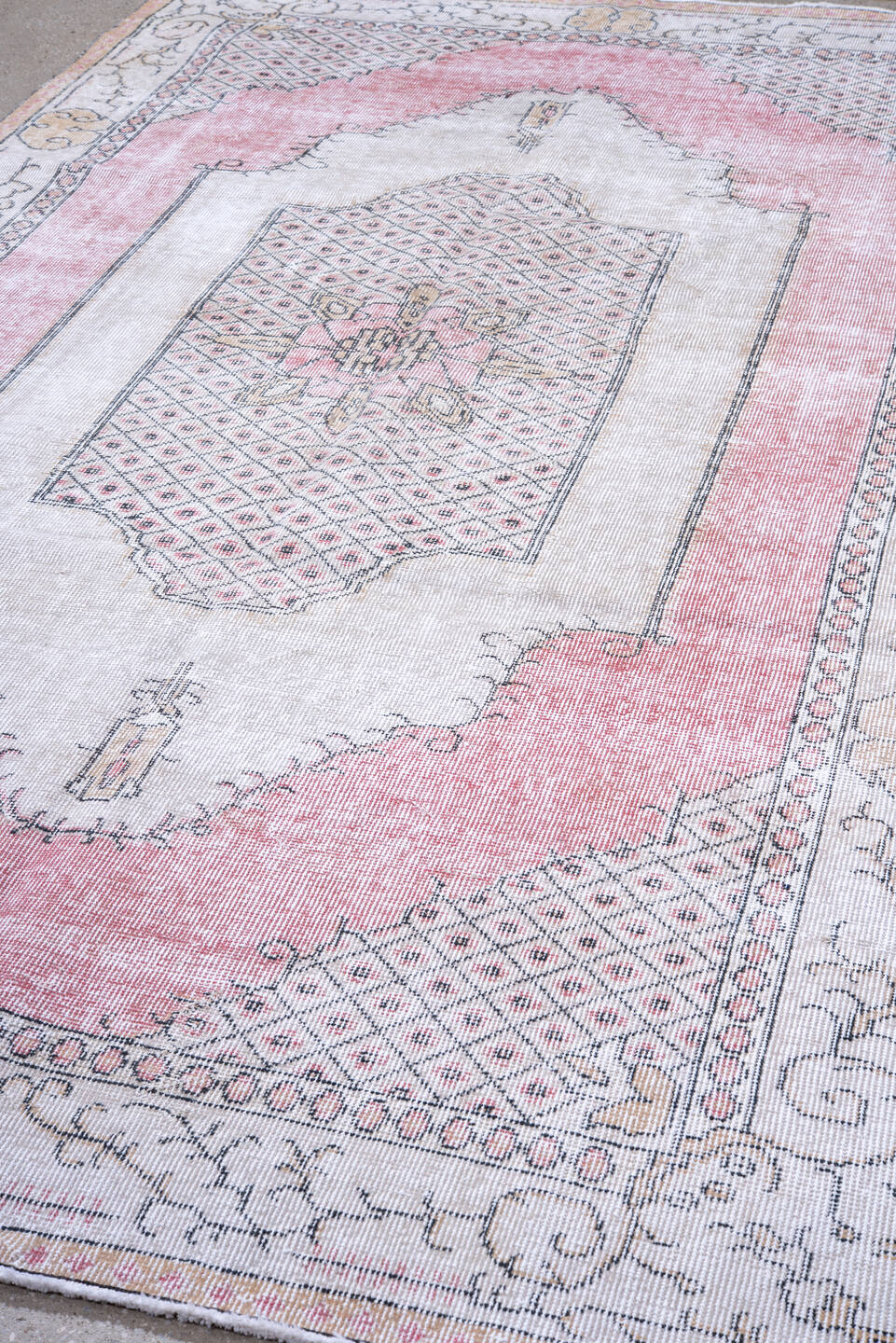 5' x 9' one-of-a-kind handmade antique Sparta medium size rug. Color palette: ivory, blush, pink, taupe, charcoal, rose
