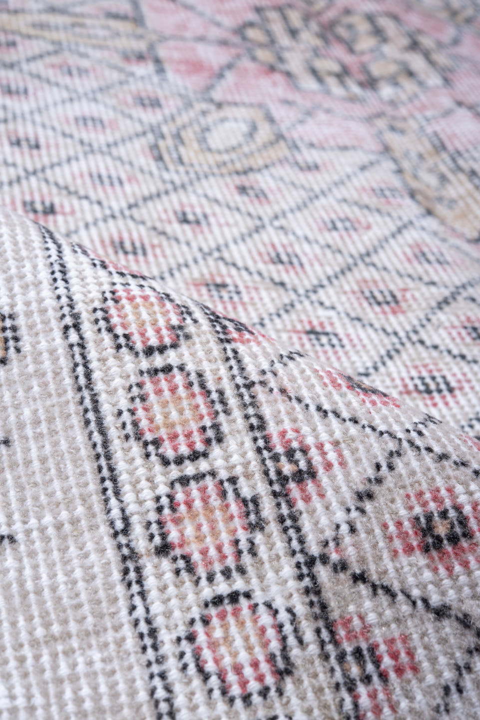 5' x 9' one-of-a-kind handmade antique Sparta medium size rug. Color palette: ivory, blush, pink, taupe, charcoal, rose