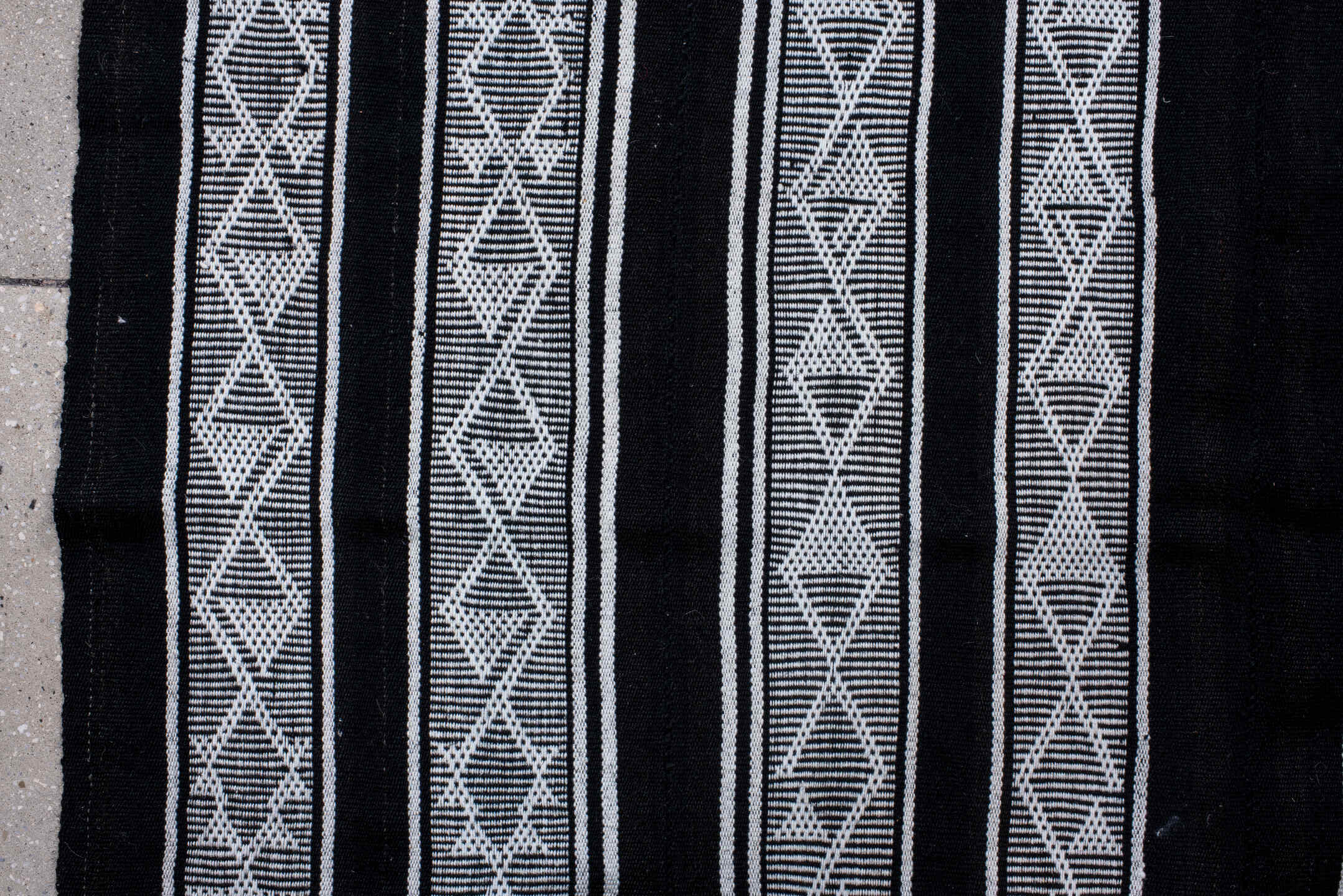 5' x 11' one-of-a-kind handmade vintage Flatweave rug. Color palette: black, blue, charcoal, dark gray, gray, lavender