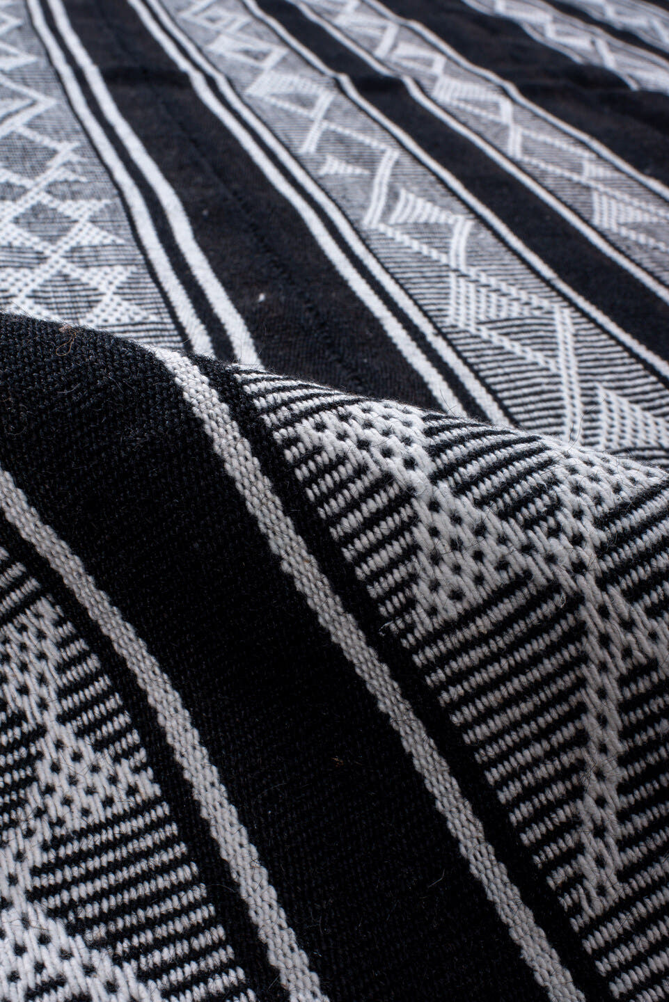 5' x 11' one-of-a-kind handmade antique Flatweave rug. Color palette: black, ivory, charcoal, gray