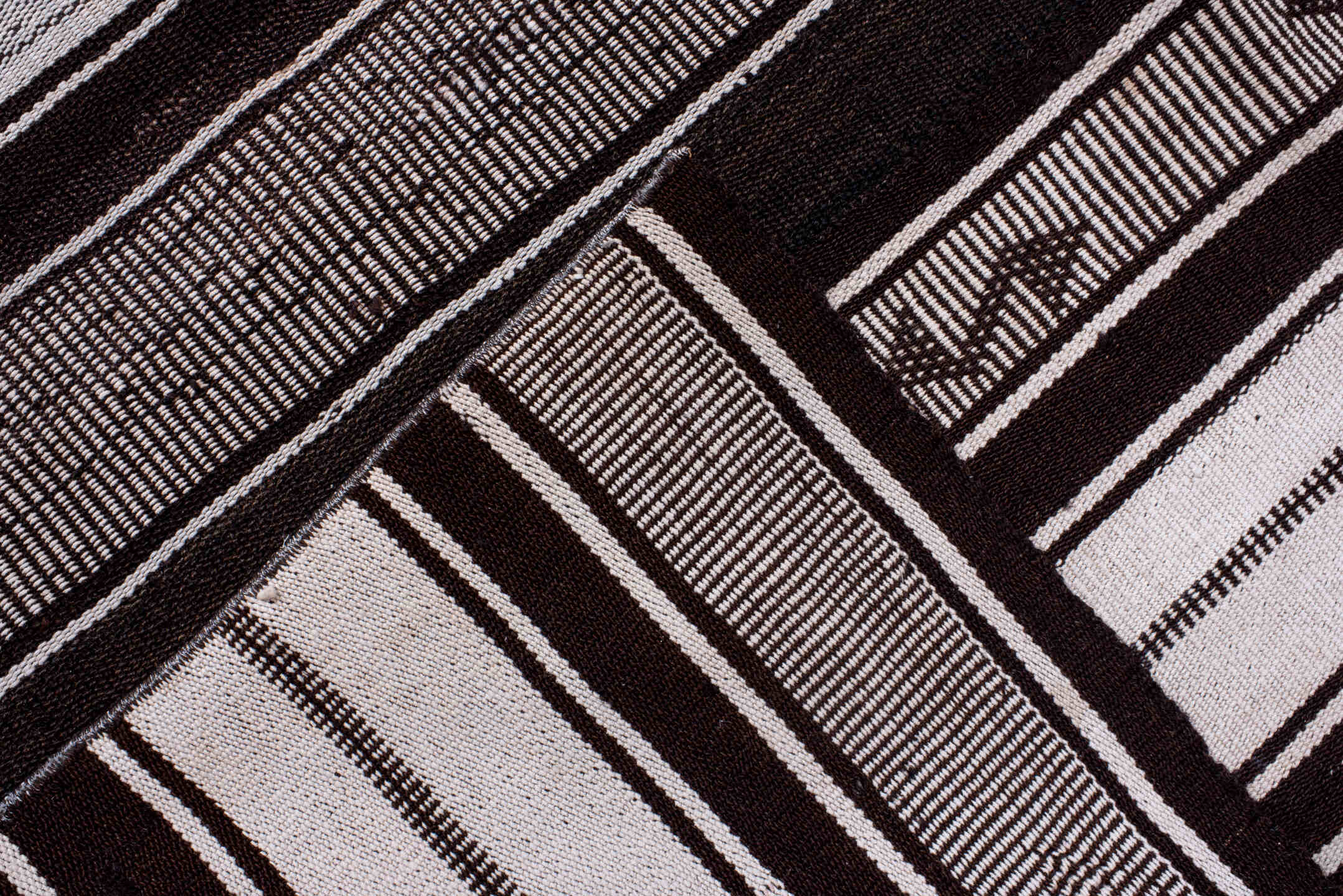 12' x 13' one-of-a-kind handmade antique Flatweave oversize rug. Color palette: ivory, charcoal, brown, taupe, gray, black