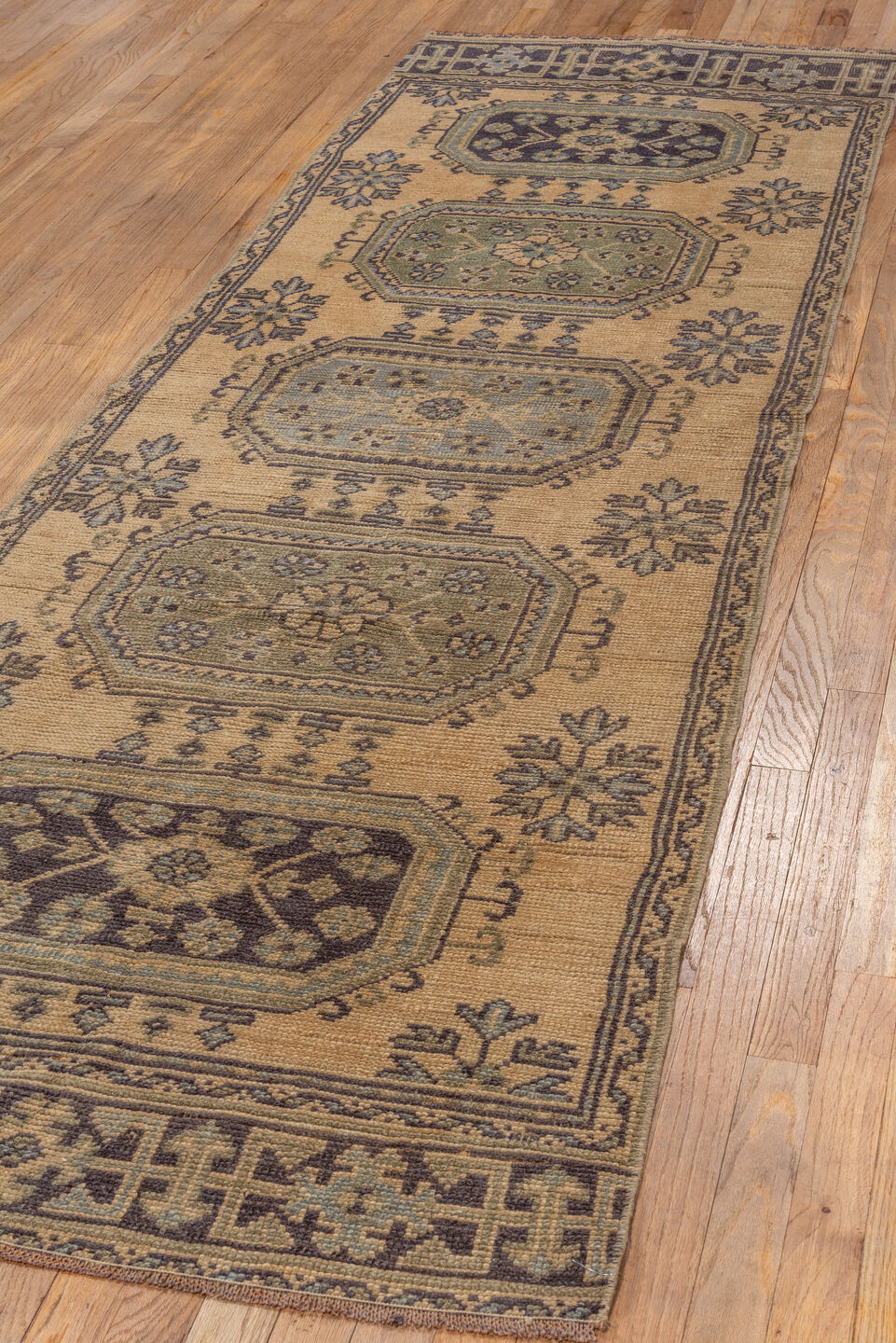 3' x 10' one-of-a-kind handmade vintage Oushak runner rug. Color palette: camel, taupe, brown, sage, slate, charcoal, olive