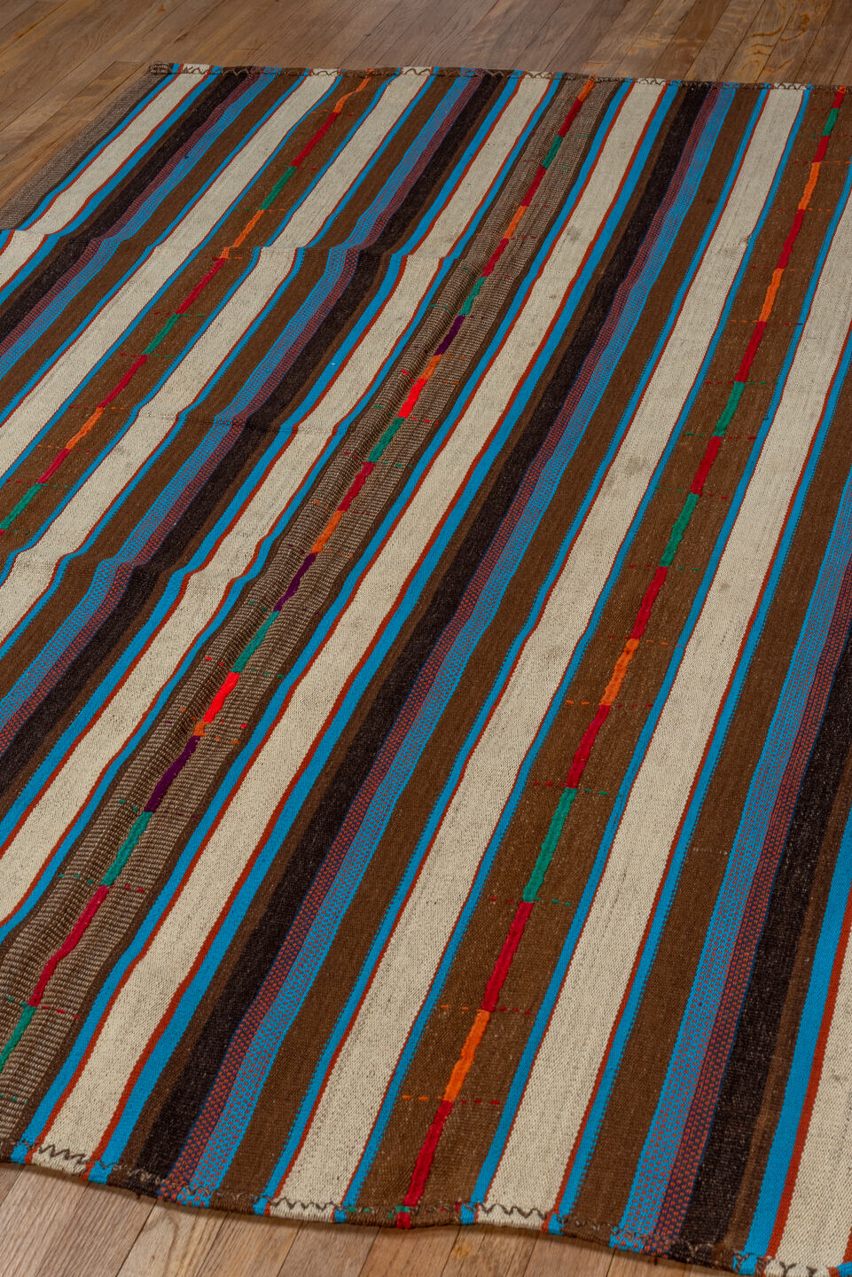5' x 7' one-of-a-kind handmade vintage Kilim rug. Color palette: ivory, brown, turquoise, charcoal, taupe, rust, crimson