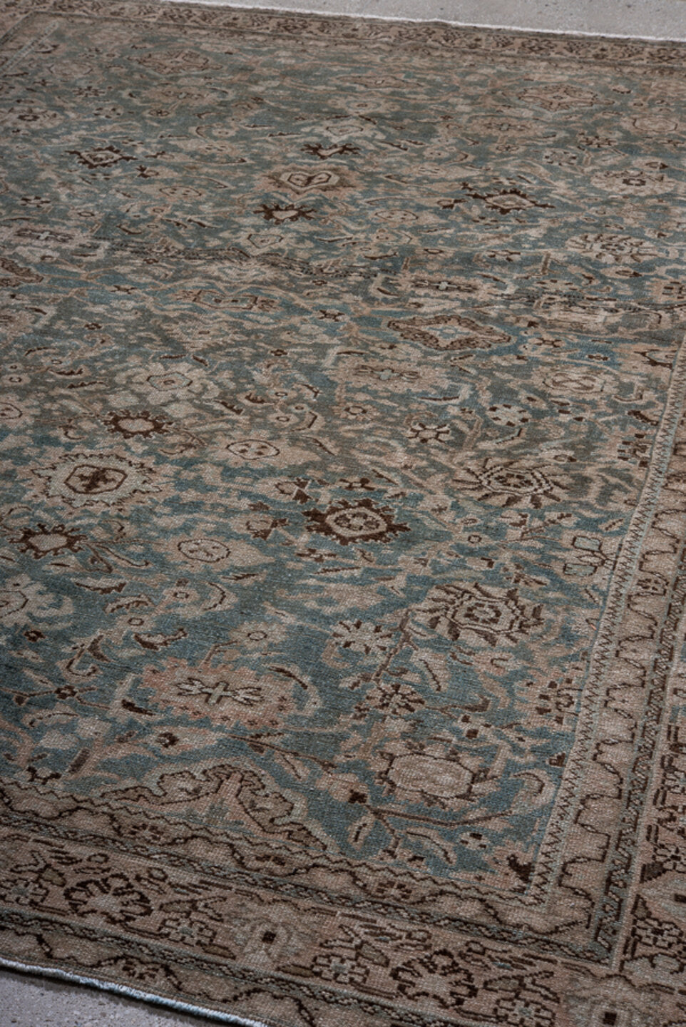 7' x 9' one-of-a-kind handmade antique Malayer rug. Color palette: blue, ivory, taupe, charcoal, gray, beige, black