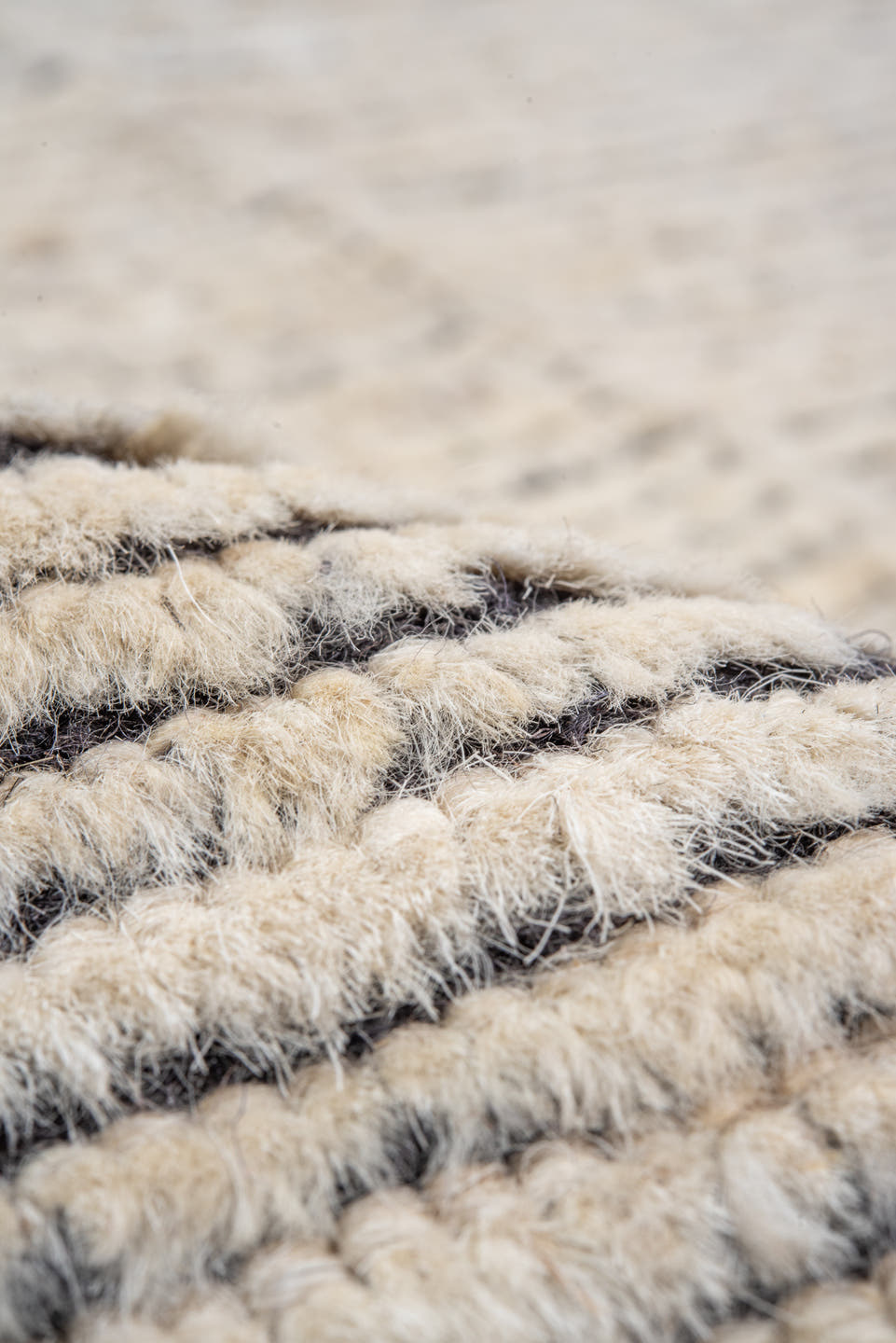 9' x 12' one-of-a-kind handmade vintage Tulu large size rug. Color palette: ivory, charcoal, taupe, gray, black, beige
