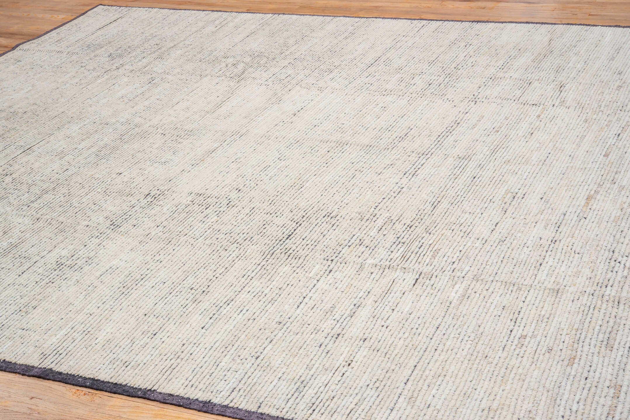 9' x 12' one-of-a-kind handmade vintage Tulu large size rug. Color palette: ivory, charcoal, taupe, gray, black, beige