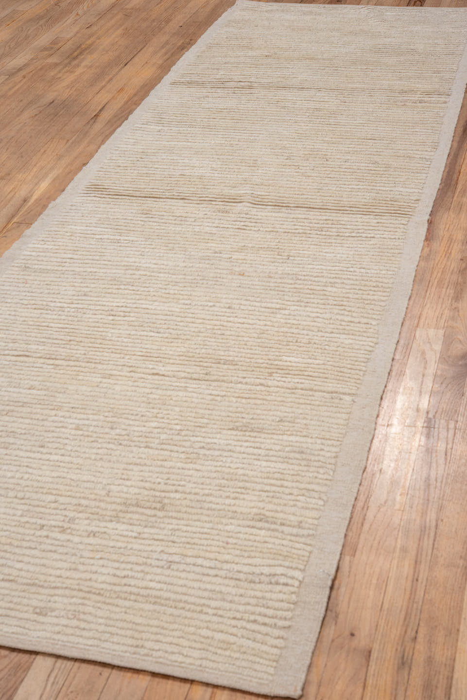 3' x 10' one-of-a-kind handmade vintage Tulu runner rug. Color palette: ivory, cream, beige, taupe, gray