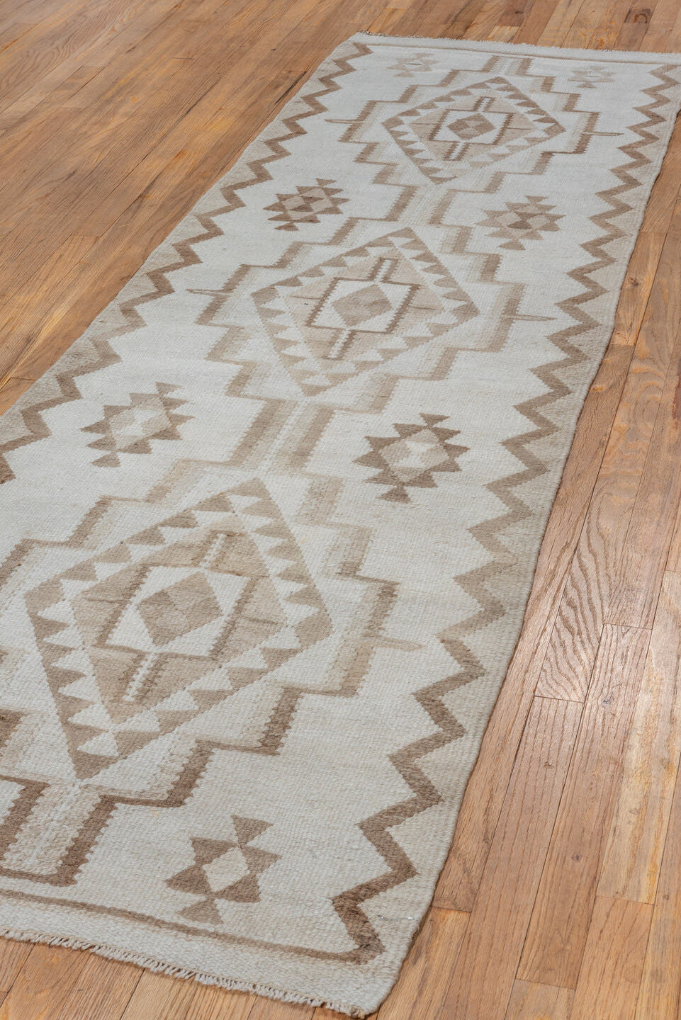 2' x 8' one-of-a-kind handmade antique Kilim runner rug. Color palette: ivory, taupe, camel, beige, gray