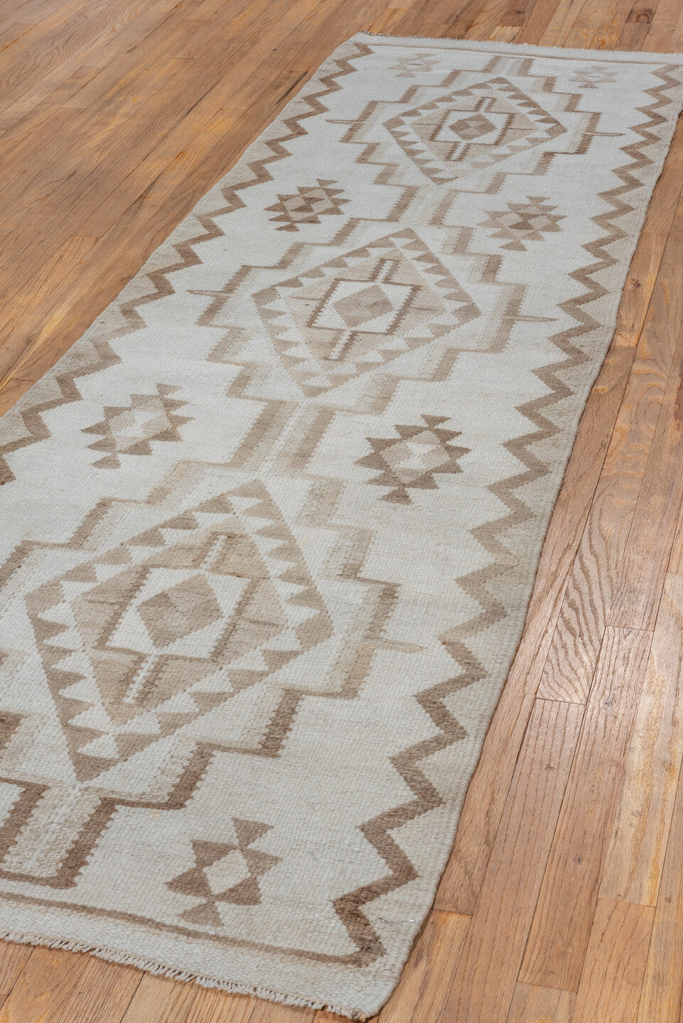 2' x 8' one-of-a-kind handmade antique Kilim runner rug. Color palette: ivory, taupe, camel, beige, gray