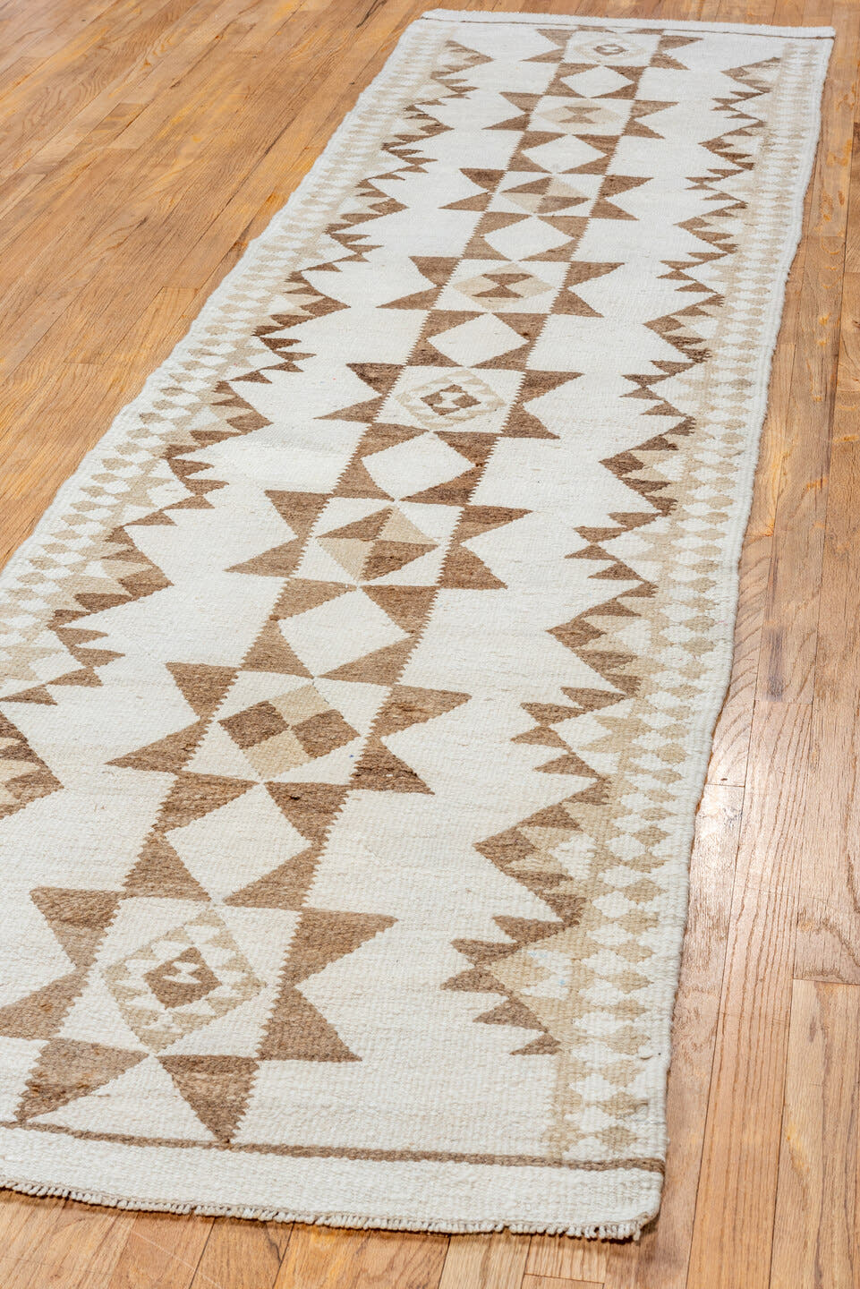 2' x 11' one-of-a-kind handmade antique Kilim runner rug. Color palette: ivory, taupe, camel, beige, gray