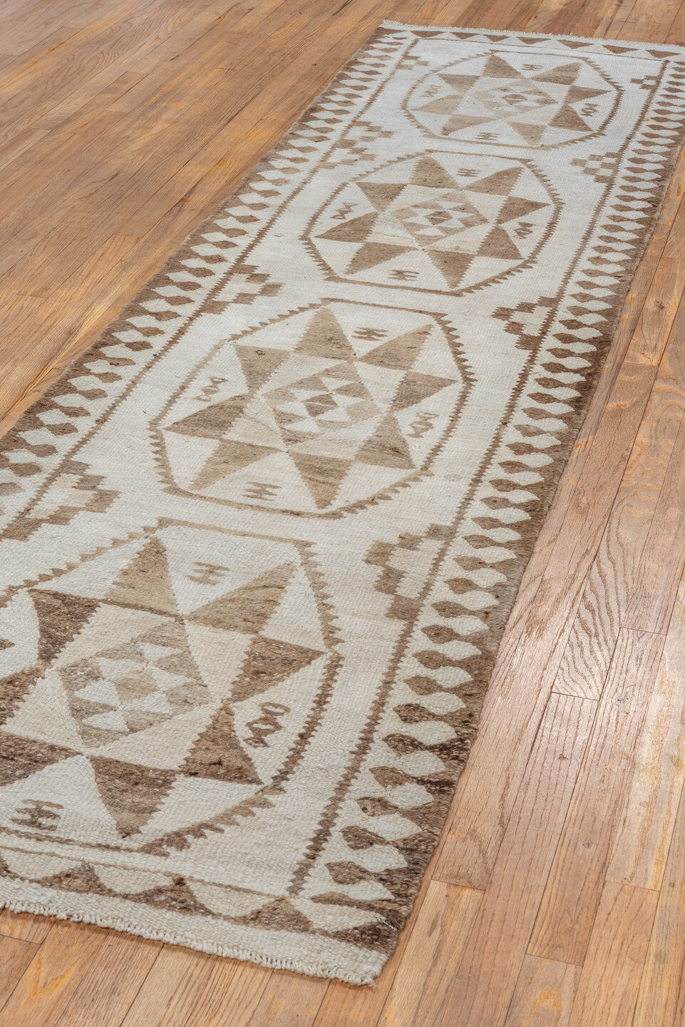 2' x 9' one-of-a-kind handmade antique Kilim runner rug. Color palette: ivory, taupe, brown, camel, beige, gray