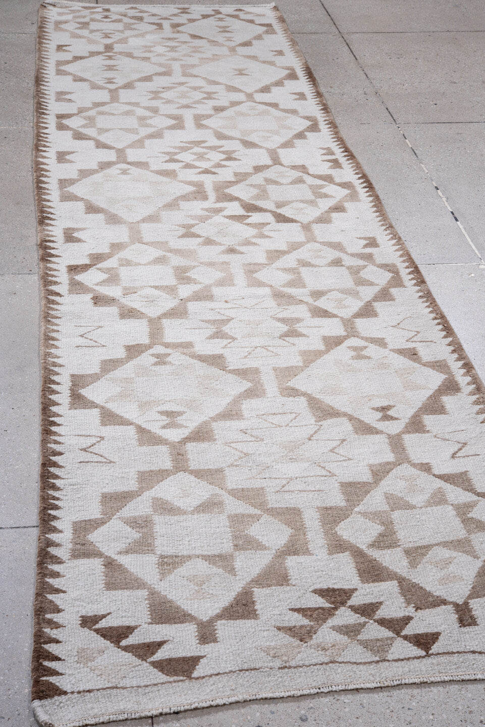 3' x 11' one-of-a-kind handmade antique Kilim runner rug. Color palette: ivory, taupe, camel, beige, gray