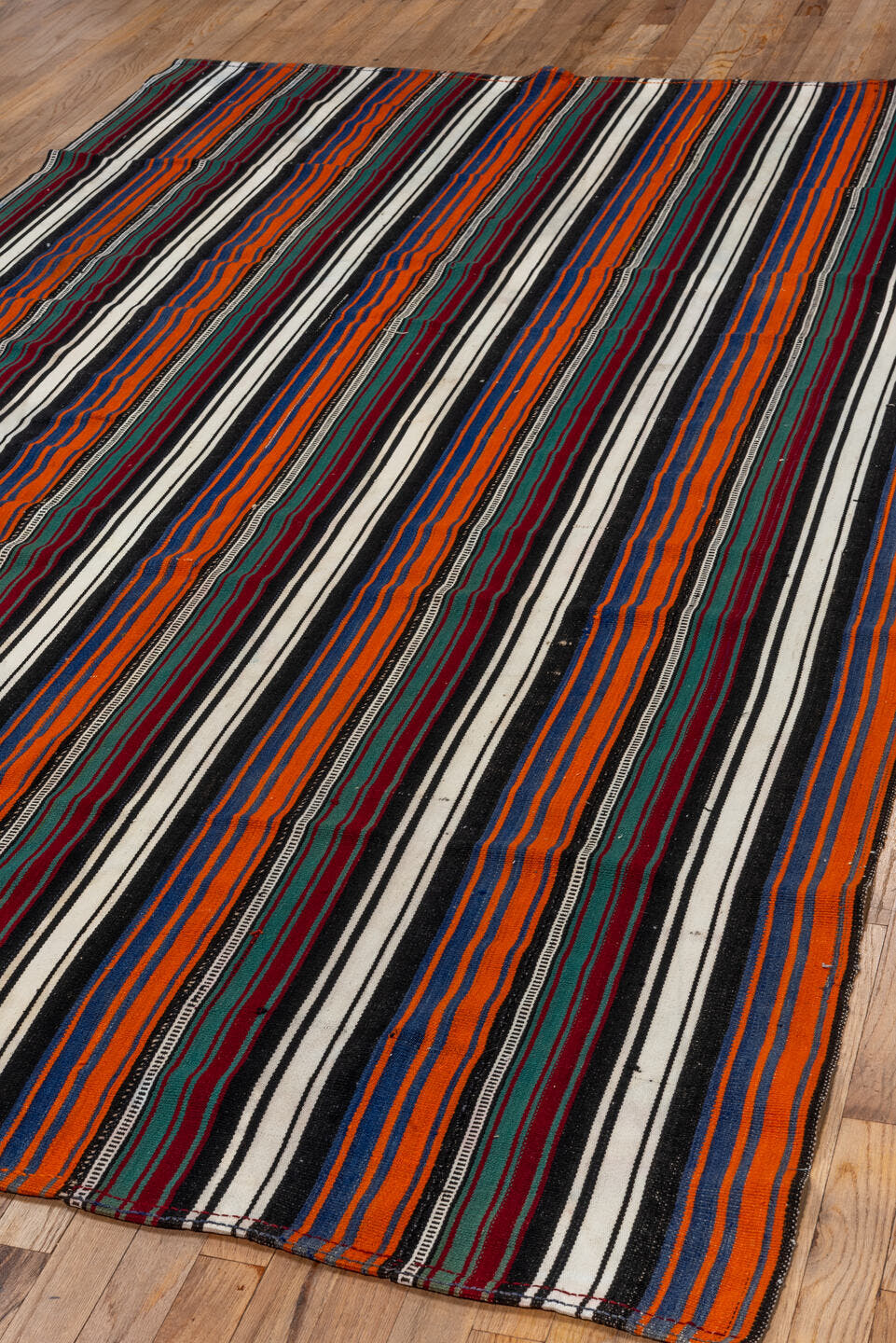 5' x 9' one-of-a-kind handmade vintage Flatweave medium size rug. Color palette: ivory, orange, black, navy, burgundy, teal