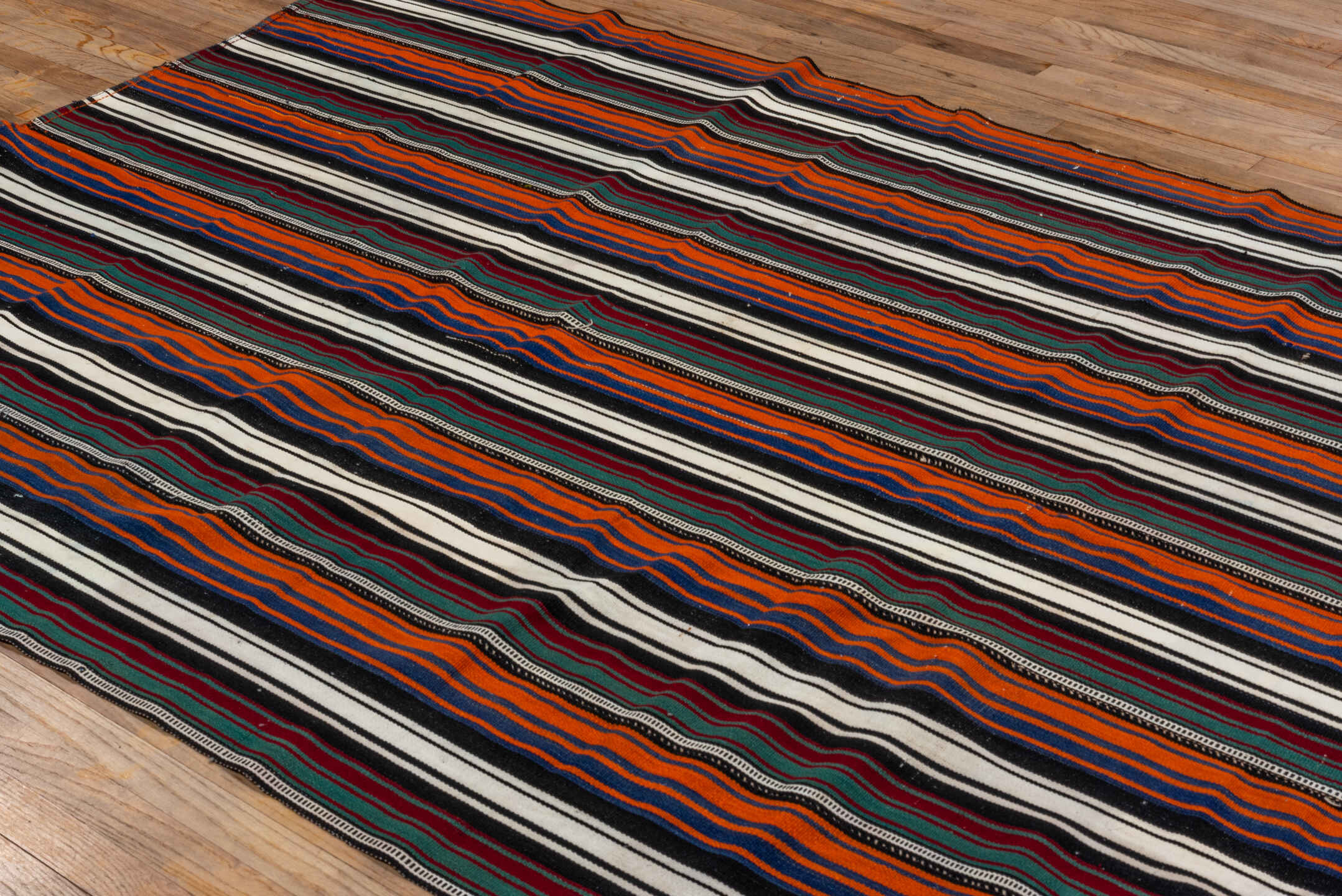 5' x 9' one-of-a-kind handmade vintage Flatweave medium size rug. Color palette: ivory, orange, black, navy, burgundy, teal