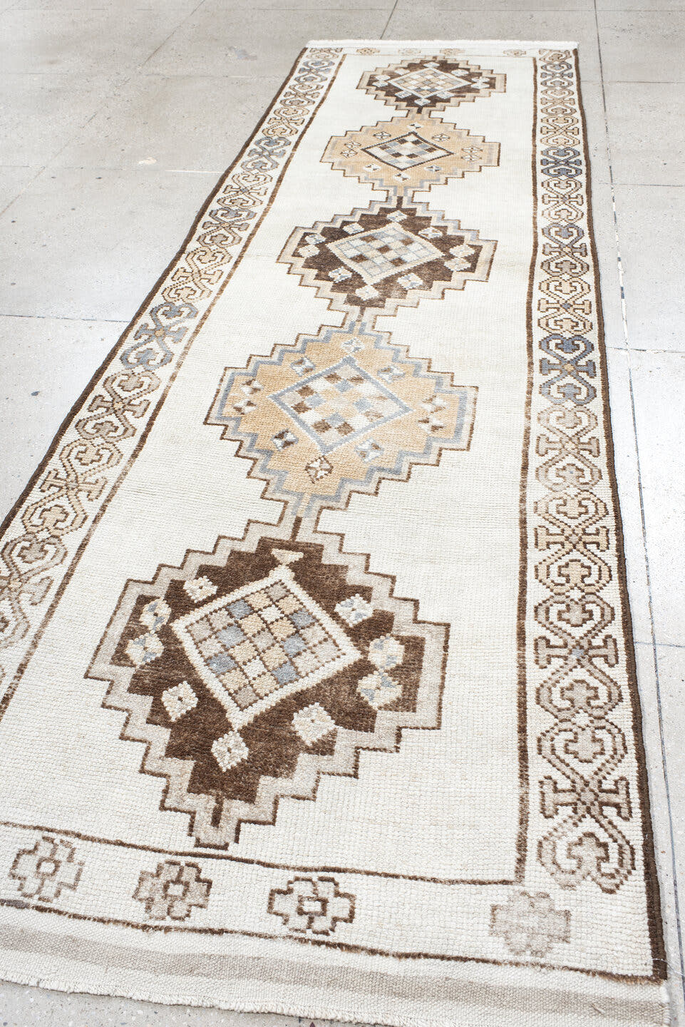 3' x 13' one-of-a-kind handmade vintage Kars runner rug. Color palette: ivory, taupe, brown, camel, pale blue, beige, gray