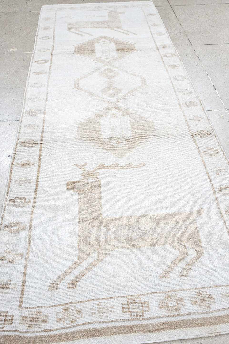 4' x 11' one-of-a-kind handmade vintage Kars runner rug. Color palette: ivory, beige, taupe, camel, gray