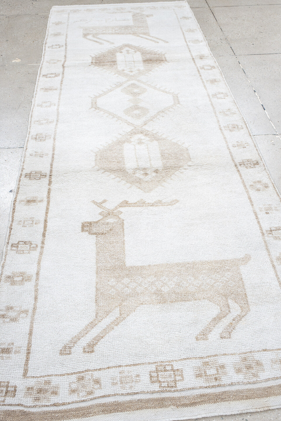 4' x 11' one-of-a-kind handmade vintage Kars runner rug. Color palette: ivory, beige, taupe, camel, gray