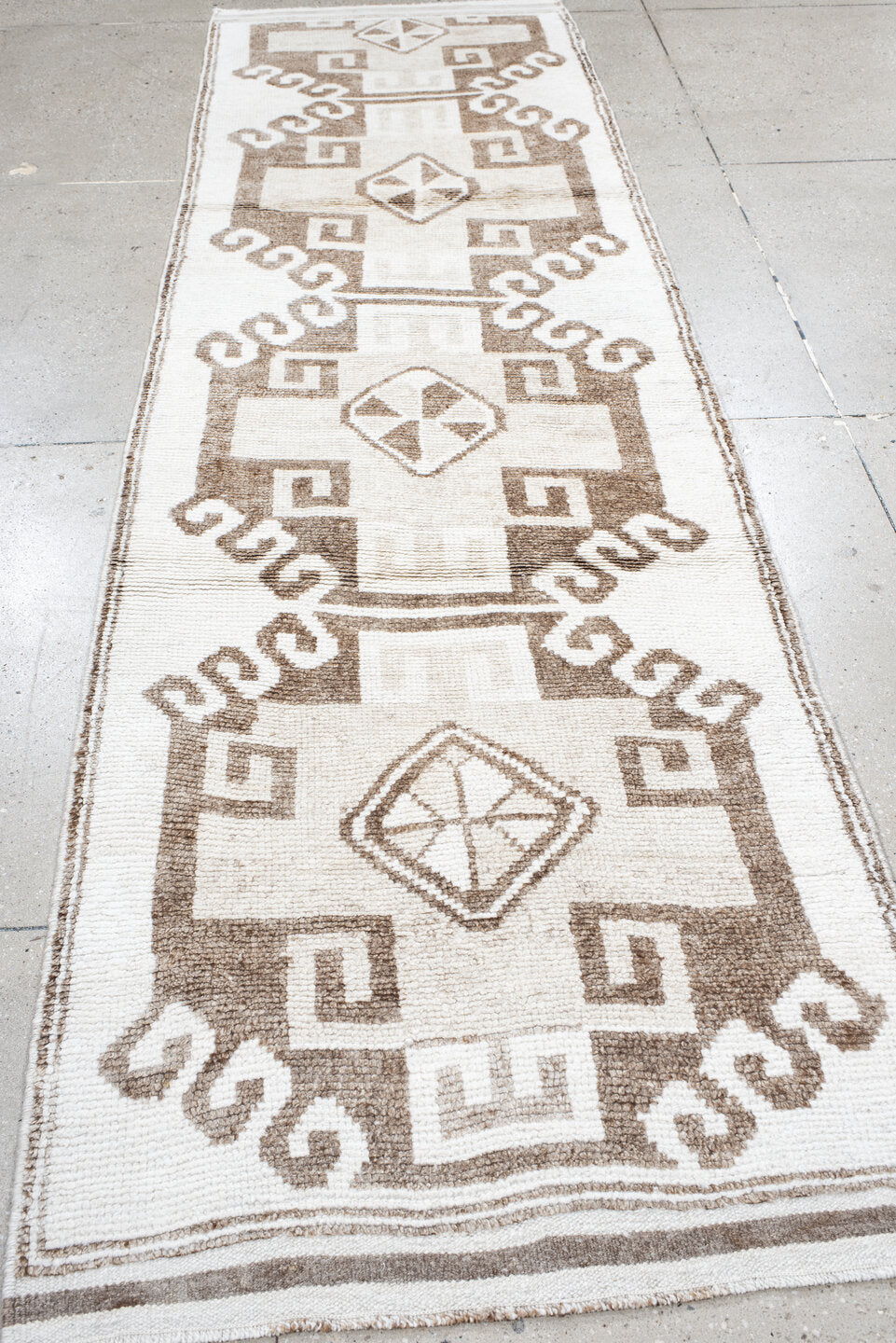 3' x 11' one-of-a-kind handmade vintage Kars runner rug. Color palette: ivory, taupe, beige, camel, gray