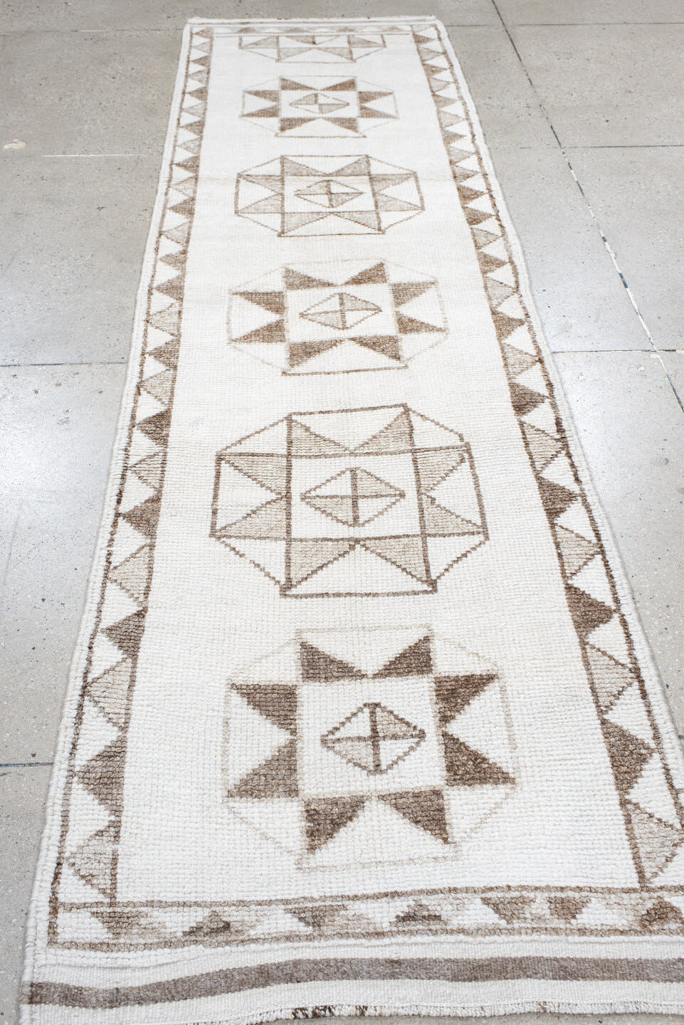 3' x 10' one-of-a-kind handmade vintage Kars runner rug. Color palette: ivory, taupe, beige, camel, gray