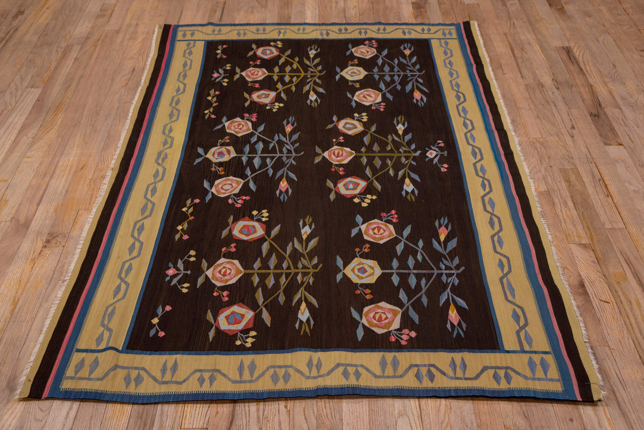 4' x 6' one-of-a-kind handmade vintage Kilim small size rug. Color palette: black, blue, brown, charcoal, gray, pink