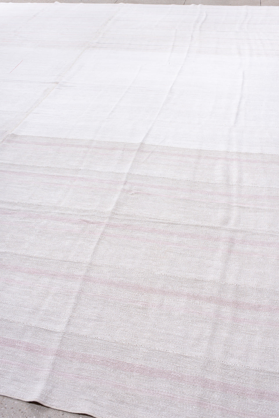 10' x 16' one-of-a-kind handmade antique Flatweave rug. Color palette: ivory, blush, lavender, cream, pale rose, pink