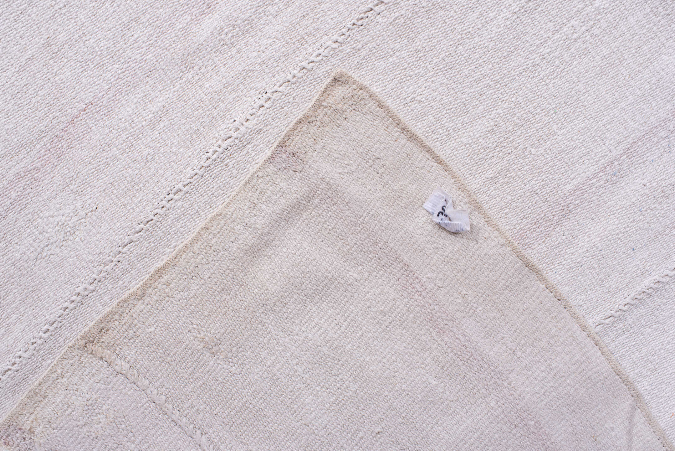 10' x 16' one-of-a-kind handmade antique Flatweave rug. Color palette: ivory, blush, lavender, cream, pale rose, pink
