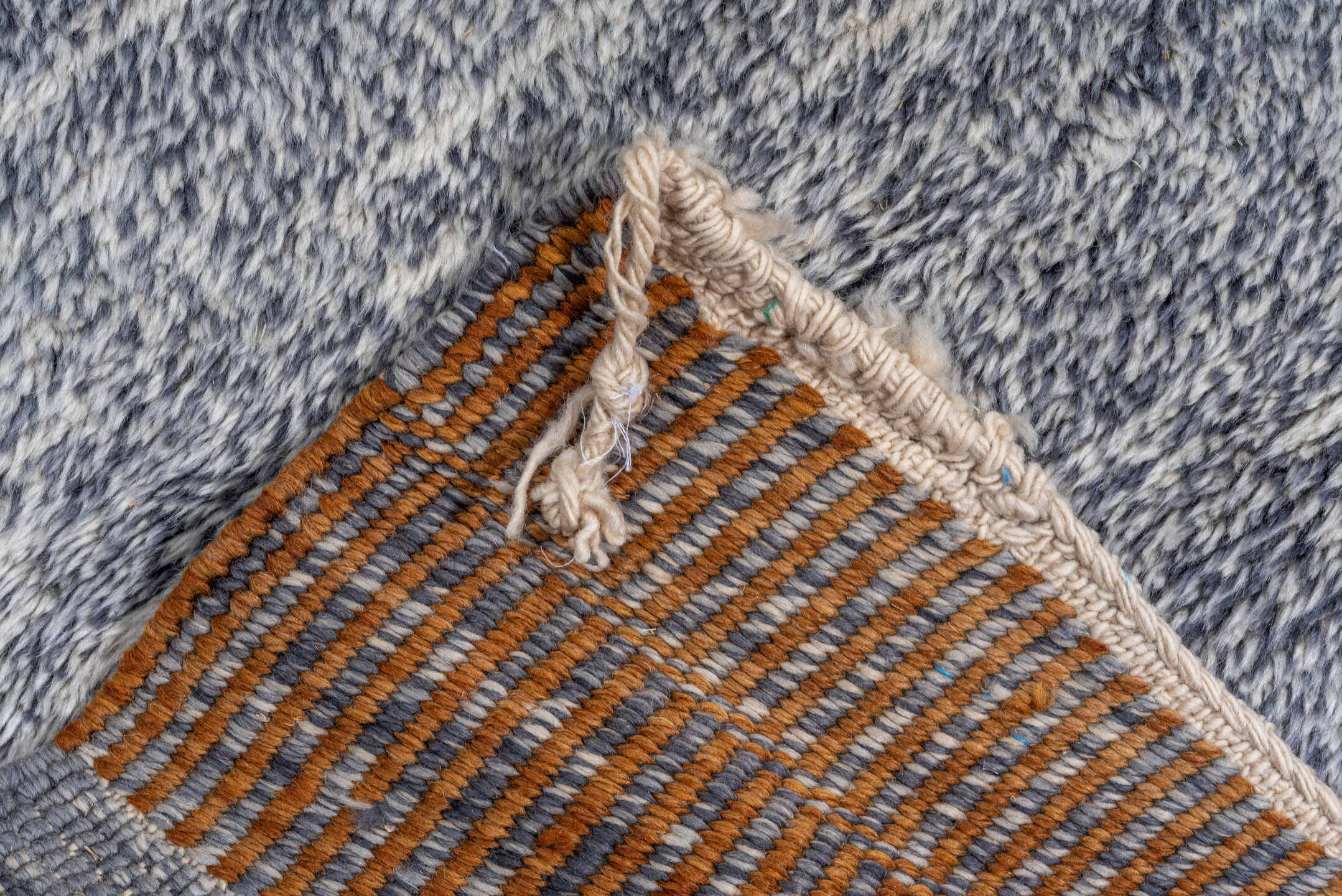 10' x 13' one-of-a-kind handmade vintage Moroccan large size rug. Color palette: black, blue, brown, charcoal, dark gray