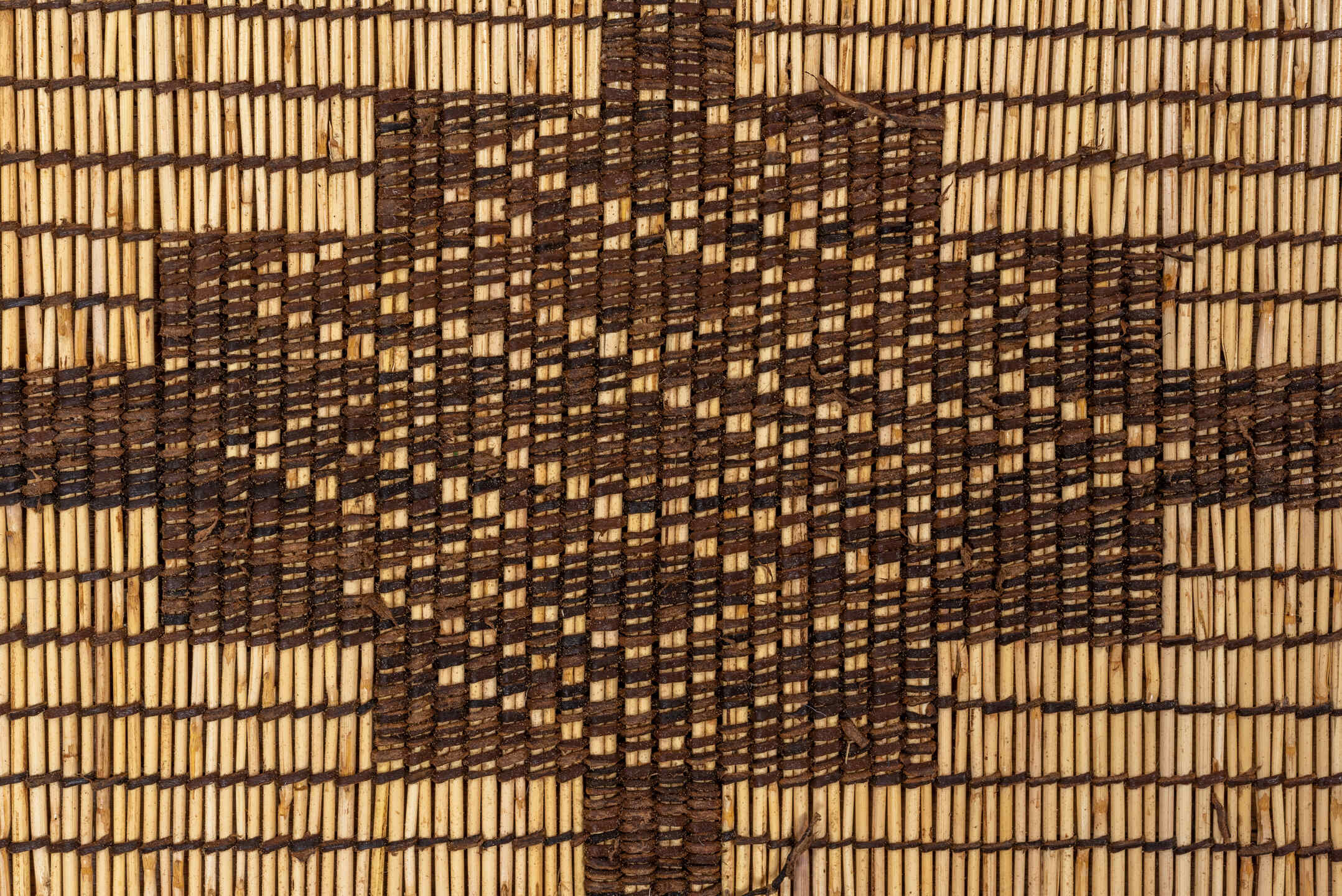 8' x 16' one-of-a-kind handmade vintage Tuareg rug. Color palette: camel, brown, tan, taupe, ivory, beige, gray