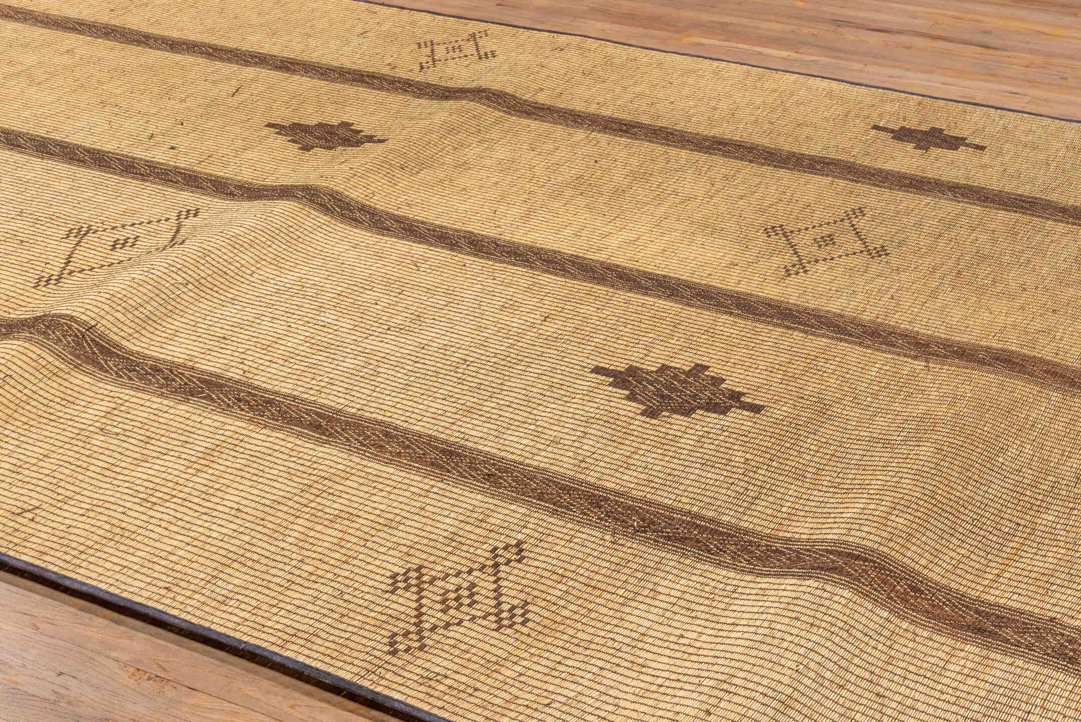 8' x 16' one-of-a-kind handmade vintage Tuareg rug. Color palette: camel, brown, tan, taupe, ivory, beige, gray