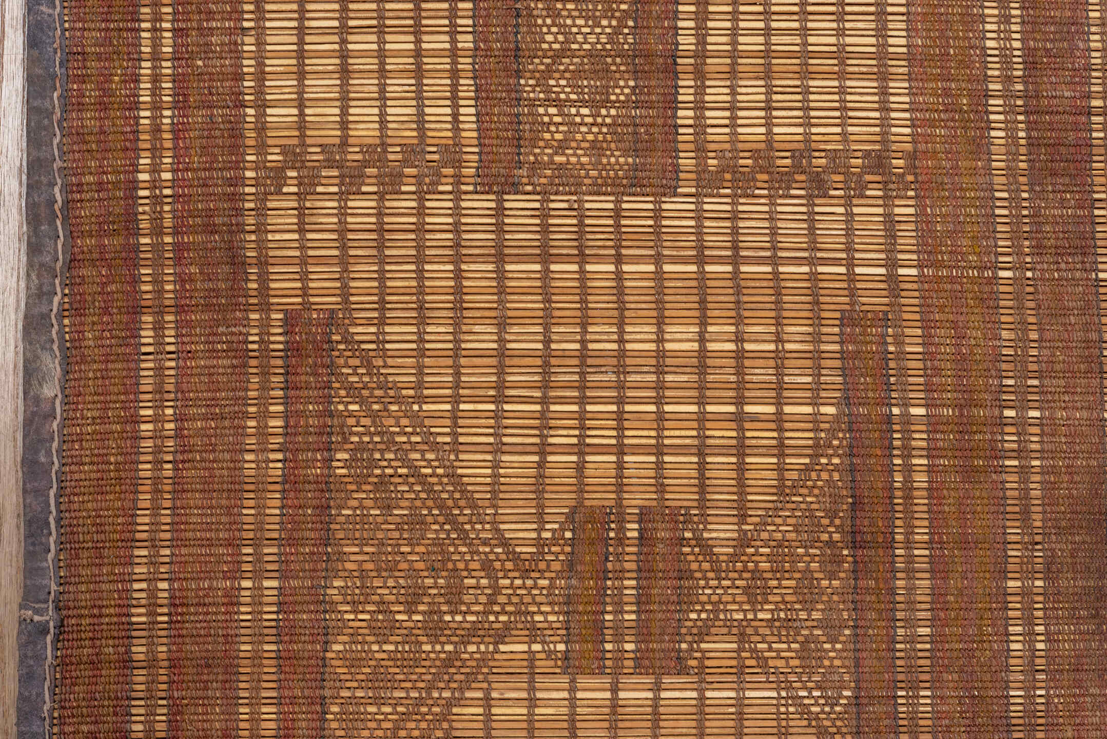 6' x 8' one-of-a-kind handmade vintage Tuareg medium size rug. Color palette: brown, off-white, orange, red, pink