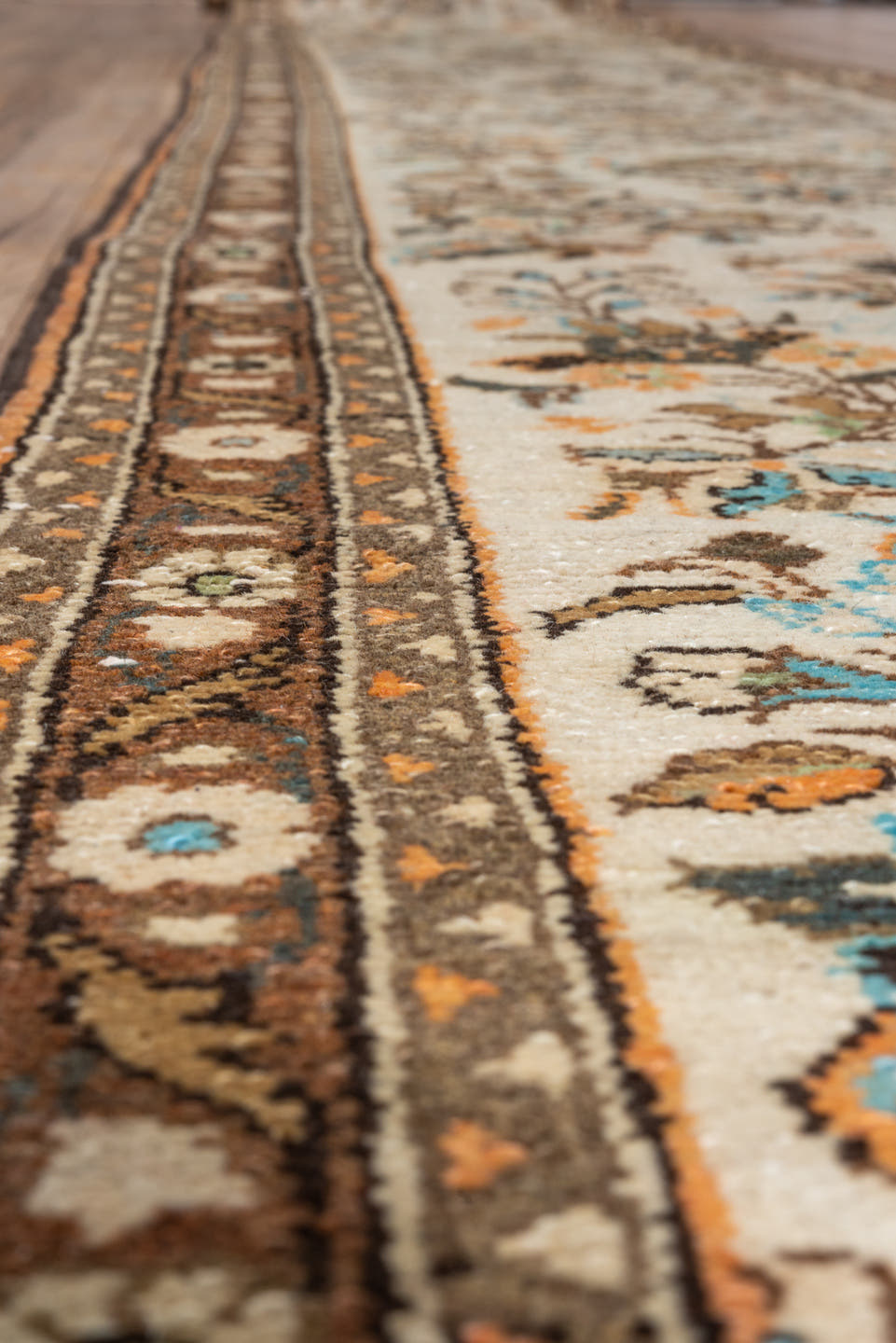 2' x 25' one-of-a-kind handmade vintage Lilian runner rug. Color palette: ivory, brown, taupe, sky blue, camel, charcoal
