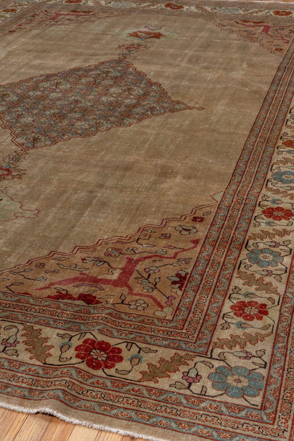 8' x 12' one-of-a-kind handmade antique Tabriz large size rug. Color palette: taupe, ivory, soft blue, rust, rose, brown