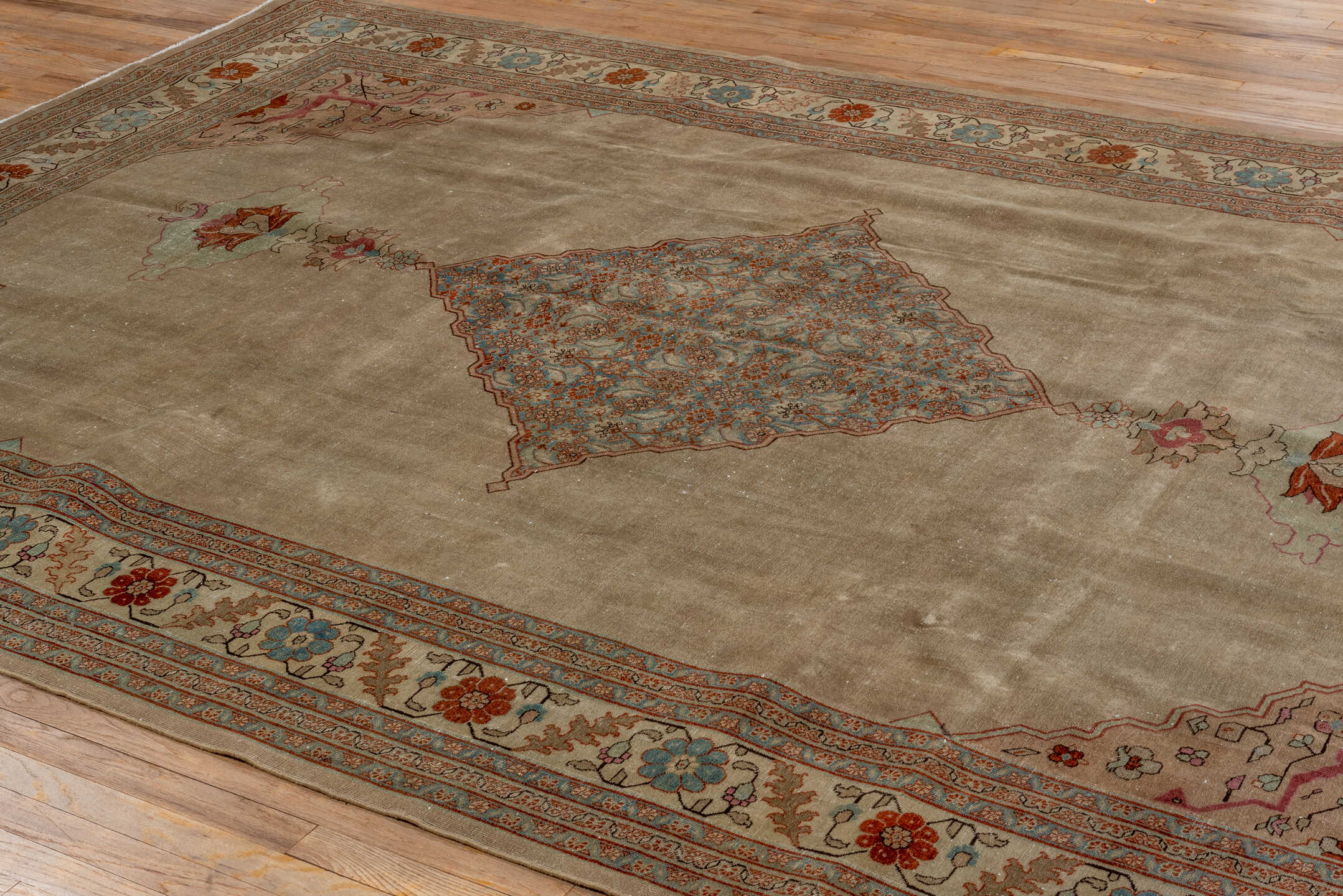 8' x 12' one-of-a-kind handmade antique Tabriz large size rug. Color palette: taupe, ivory, soft blue, rust, rose, brown